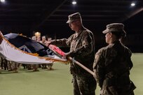 FORT KNOX, Ky. - A V Corps Soldier holds the corps’ colors as V Corps’ Deputy Commanding General- Support, Maj. Gen. Robert D. Burke cases them in preparation for deployment to Germany, March 7. The V Corps main headquarters will deploy to provide additional command and control of U.S. Army forces in Europe. (U.S. Army Photo by Renee Rhodes)