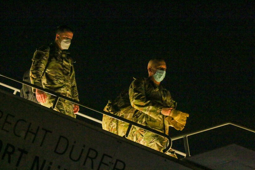 U.S. Soldiers with the Fort Knox, Kentucky-based V Corps arrive at Nuremberg, Germany, March 8, 2022. V Corps’ main headquarters will complement the forward headquarters located in Poland, providing a more robust presence in Europe to synchronize current contingency operations, support the ongoing mission to reinforce NATO’s eastern flank, and coordinate multinational exercises across the continent. (U.S. Army photo by Spc. Christian Carrillo)