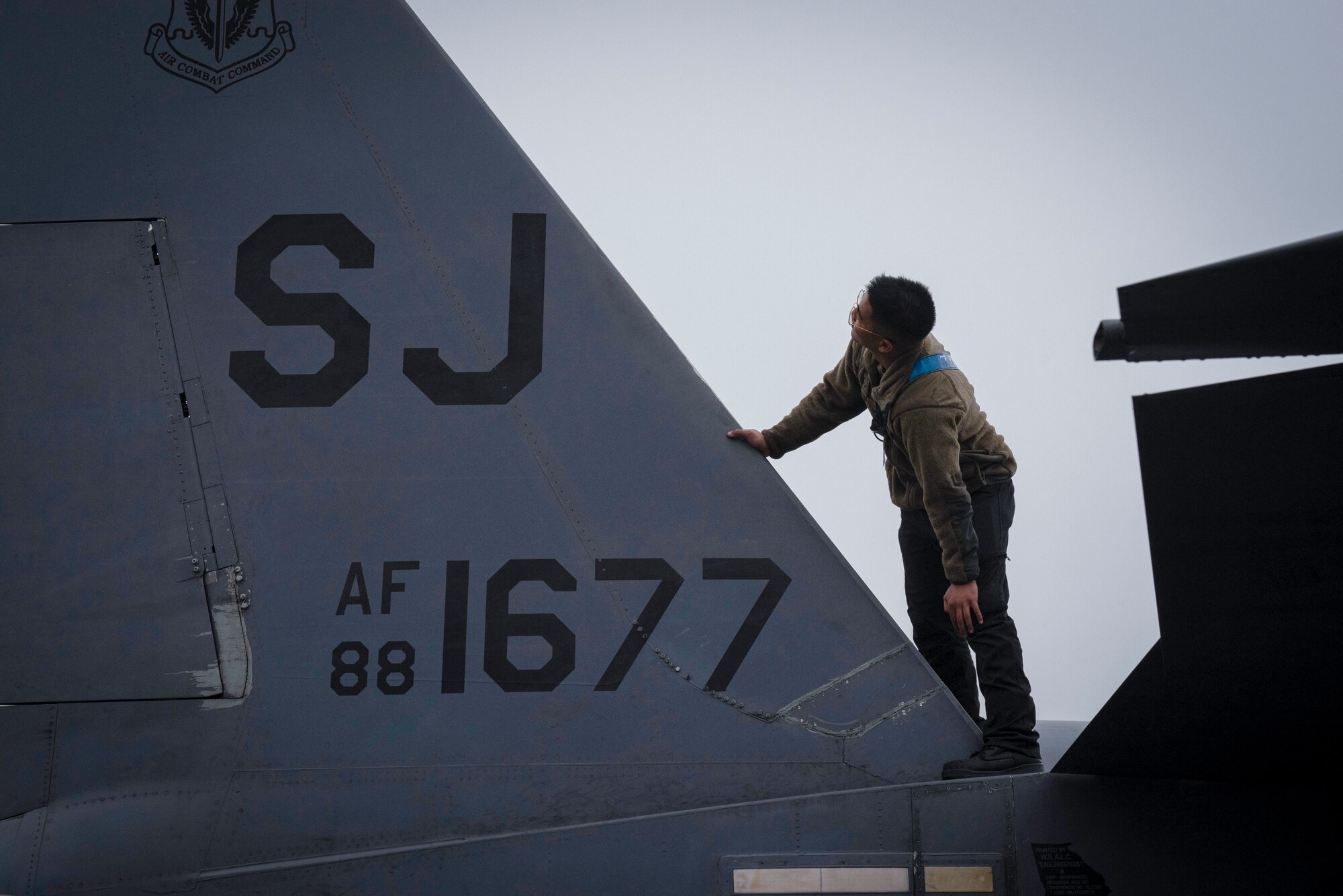 Senior Airman Jace Riveral, 334th Fighter Generation Squadron crew chief, inspects the exterior of an F-15E Strike Eagle at Seymour Johnson Air Force Base, North Carolina, March 9, 2022. The aircraft is inspected by aircrew members before every flight. (U.S. Air Force photo by Airman 1st Class Sabrina Fuller)