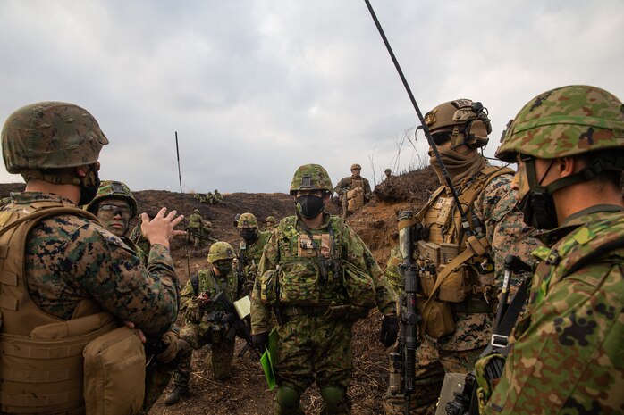 U.S. Marines with Battalion Landing Team 1/5, 31st Marine Expeditionary Unit, and soldiers with Amphibious Rapid Deployment Brigade, conduct integrated coordination of an air assault training exercise, on Combined Arms Training Center Camp Fuji, Japan, March 9, 2022. The training exercise was conducted to build proficiency in rapidly seizing and defending key terrain. Maritime Defense Exercise Amphibious Rapid Deployment Brigade is a bilateral exercise meant to increase interoperability and strengthen ties between U.S. and Japanese forces for the defense of Japan.
