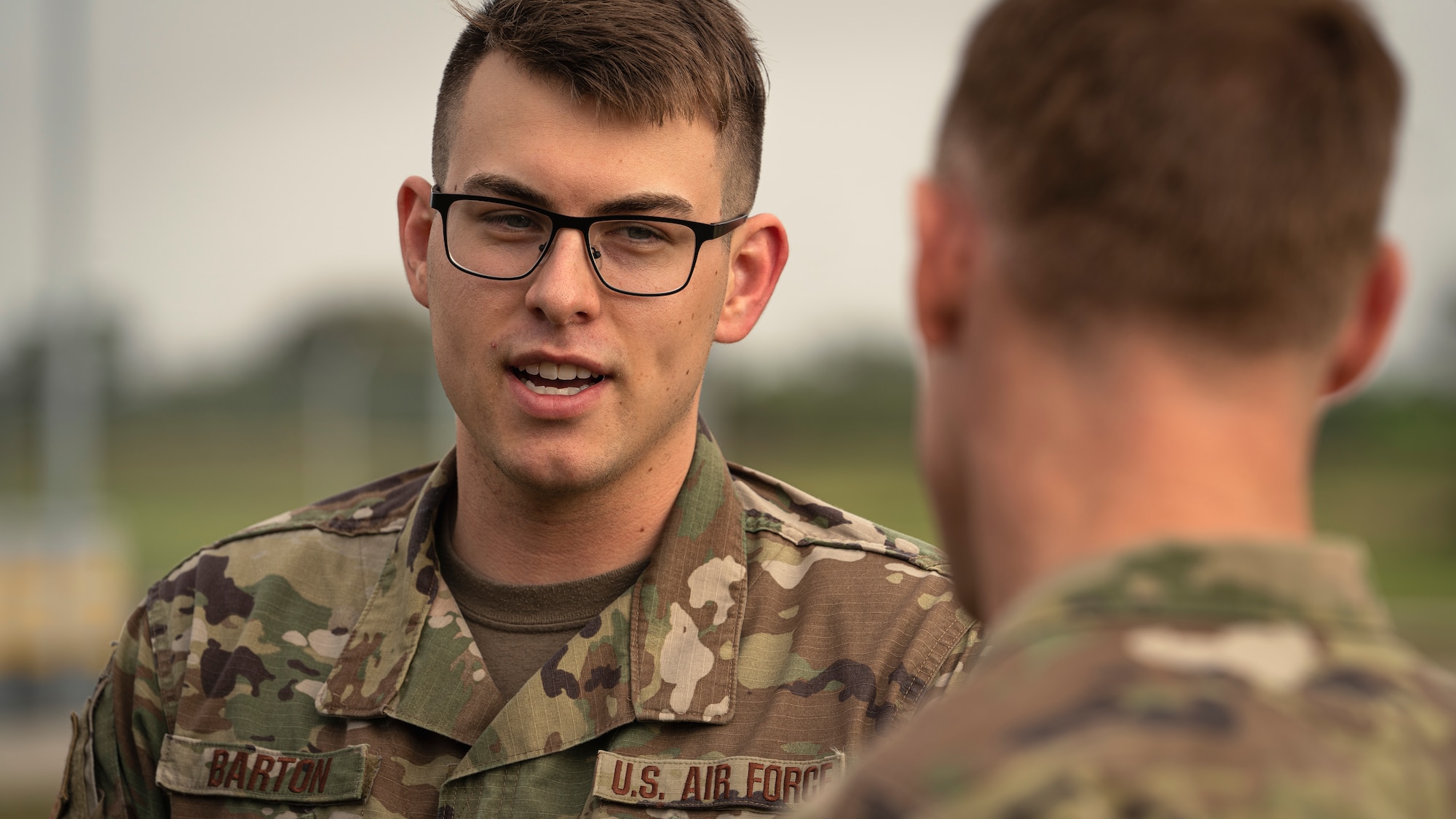 U.S. Air Force Staff Sgt. Kristopher Barton, 6th Communications Squadron Radio Frequency Transmission Systems base transmission supervisor, speaks with U.S. Air Force Col. Benjamin Jonsson, 6th Air Refueling Wing (ARW) commander, at MacDill Air Force Base, Florida, March 10, 2022.
