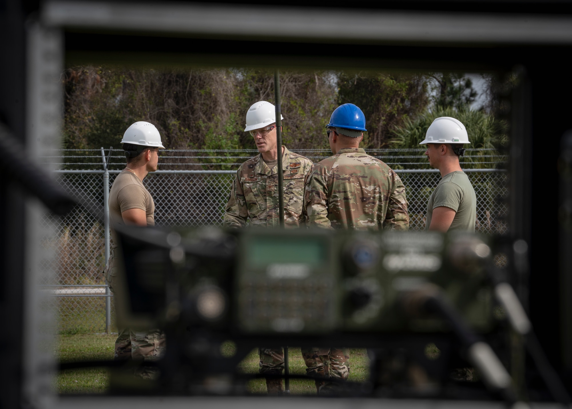 U.S. Air Force Col. Benjamin Jonsson, 6th Air Refueling Wing commander, visits with Radio Frequency Transmission Systems (RFTS) technicians assigned to the 6th Communications Squadron at MacDill Air Force Base, Florida, March. 10, 2022.