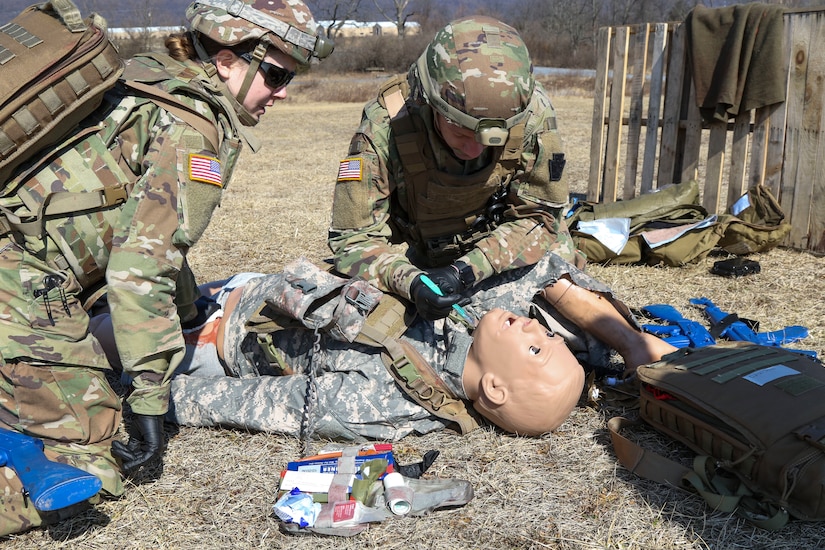 Combat medics with the Pennsylvania National Guard treat a simulated casualty as part of the TC8-800 medic sustainment course March 2 at Fort Indiantown Gap, Pa. The course, which was  held Feb. 17-March 3, gave the 17 participants the opportunity to train together with other medics outside their home units, without taking up time during drill weekends where most training is conducted. (U.S. Army National Guard photo by Staff Sgt. Zane Craig)