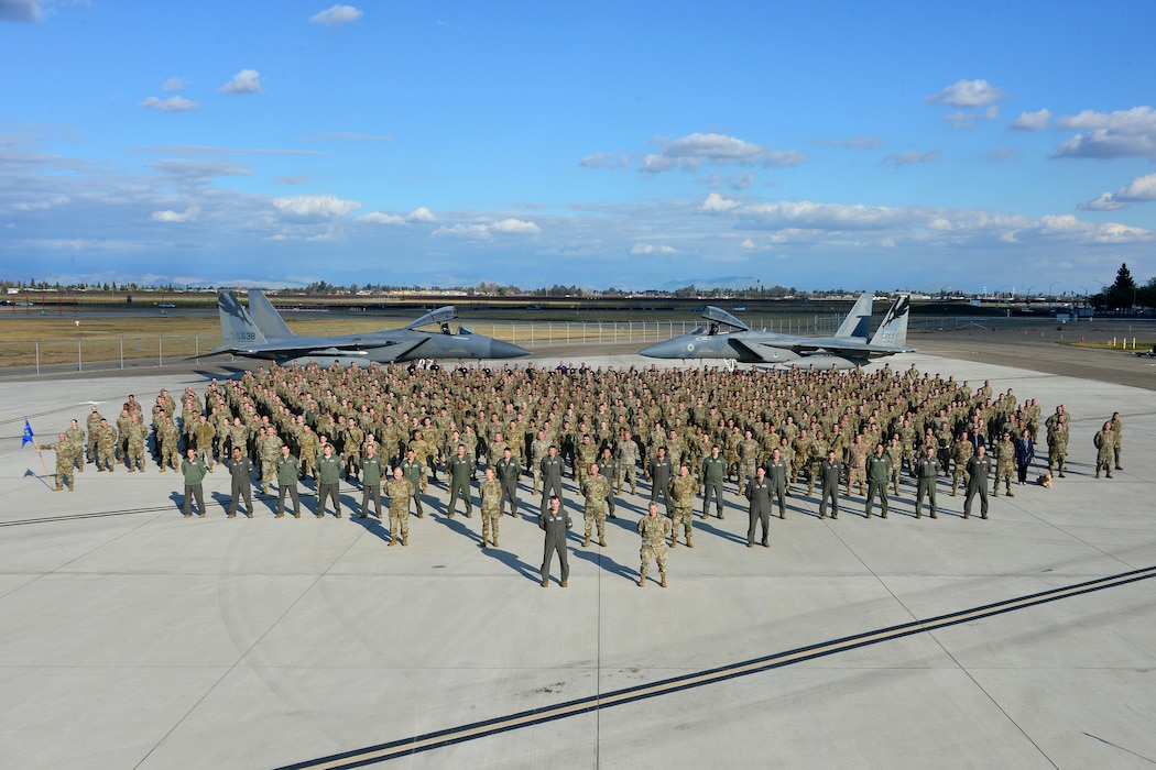 The 144th Fighter Wing stands together for a photo, Mar. 6, 2022. (Air National Guard photo by Master Sgt. Charles Vaughn)