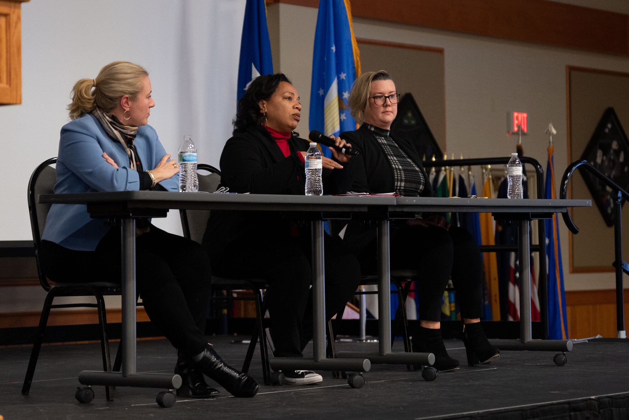 From the left, Summer Jones, assistant deputy administrator for production modernization program; Dr. Njema Frazier, assistant deputy administrator for strategic partnership programs; and Brooke Samples, senior policy advisor of the Office of Defense programs; speak during a National Nuclear Security Administration panel March 10, 2022, at Malmstrom Air Force Base, Mont.