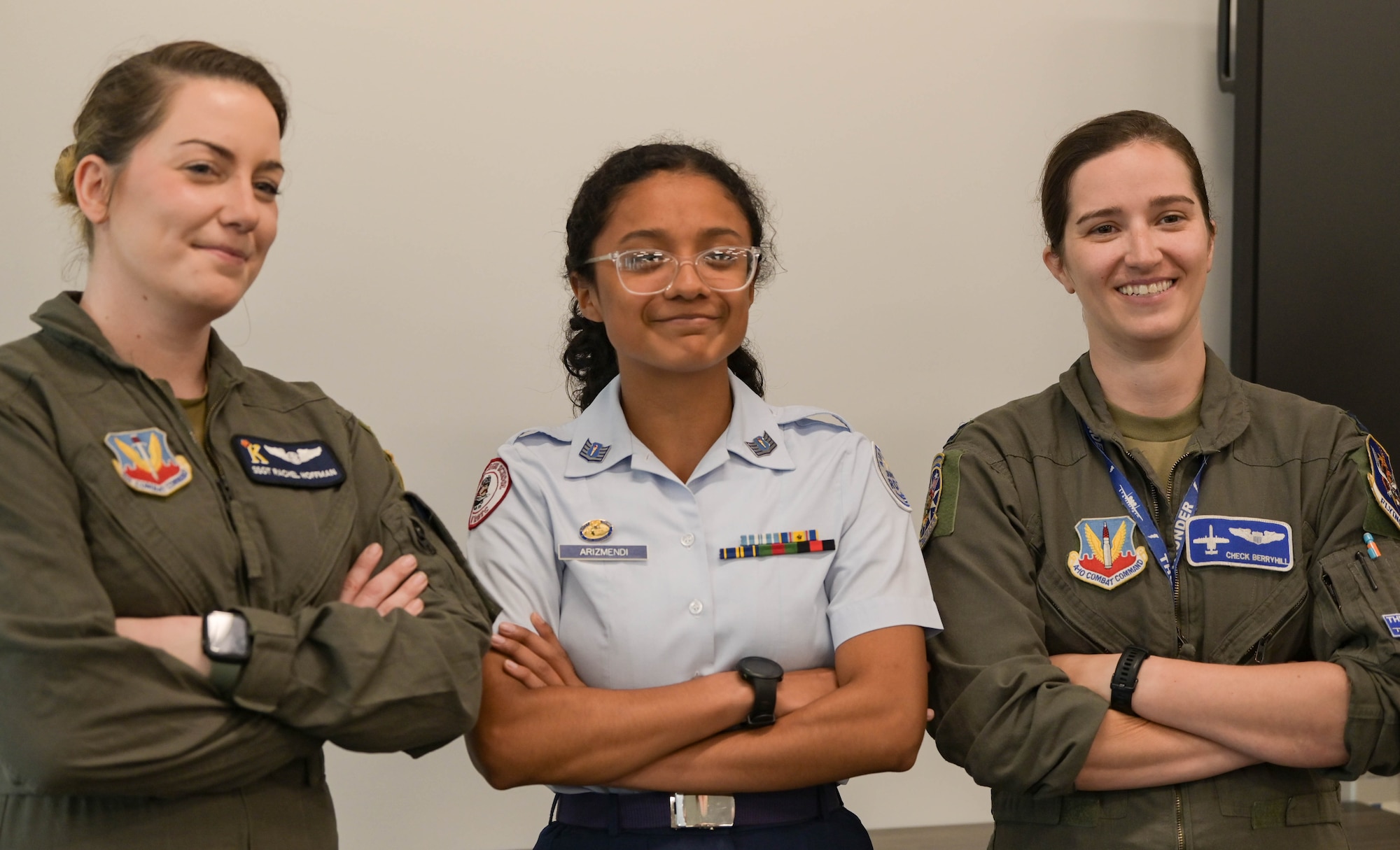 U.S. Air Force Staff Sgt. Rachel Hoffman, 71st Rescue Squadron HC-130J Combat King II loadmaster, left, stands beside an Air Force Junior ROTC cadet from Valdosta High School, middle, and Capt. Coleen Berryhill, 74th Fighter Squadron A-10C Thunderbolt II pilot, right, March 10, 2022, at Lowndes High School, Valdosta, Georgia. Students ranging from fifth grade to twelfth grade had the chance to meet ten service members and hear their various experiences in the military. (U.S. Air Force photo by Senior Airman Rebeckah Medeiros)
