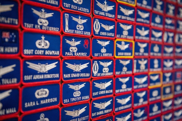 A board of patches representing the current and prior members of the 460th Operations Support Squadron stands at the 460th OSS inactivation ceremony March 11, 2022, at the Leadership Development Center on Buckley Space Force Base, Colo.