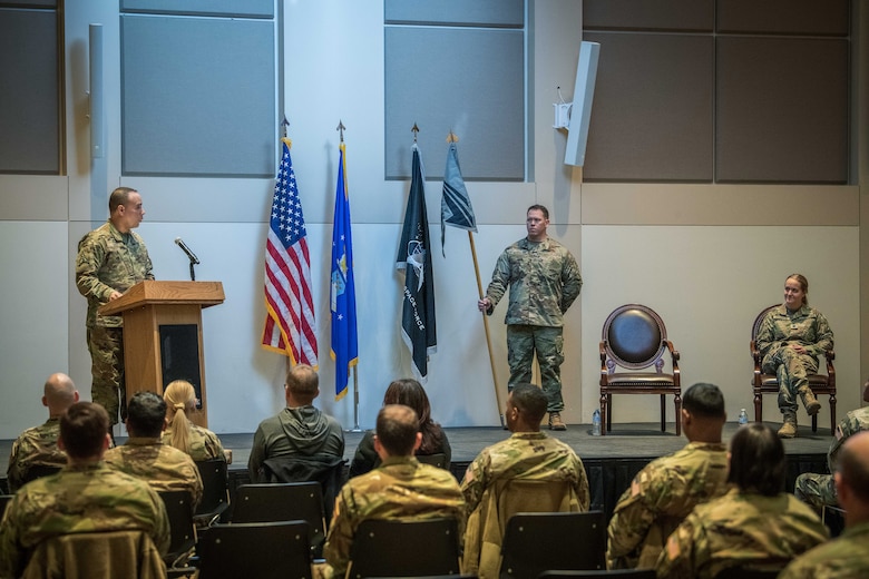 U.S. Space Force Col. Miguel Cruz (left), the Space Delta 4 commander, gives his remarks as the presiding officer during the inactivation ceremony of the 460th Operations Support Squadron and activation of the DEL 4 S-Staff March 11, 2022, at the Leadership Development Center on Buckley Space Force Base, Colo.