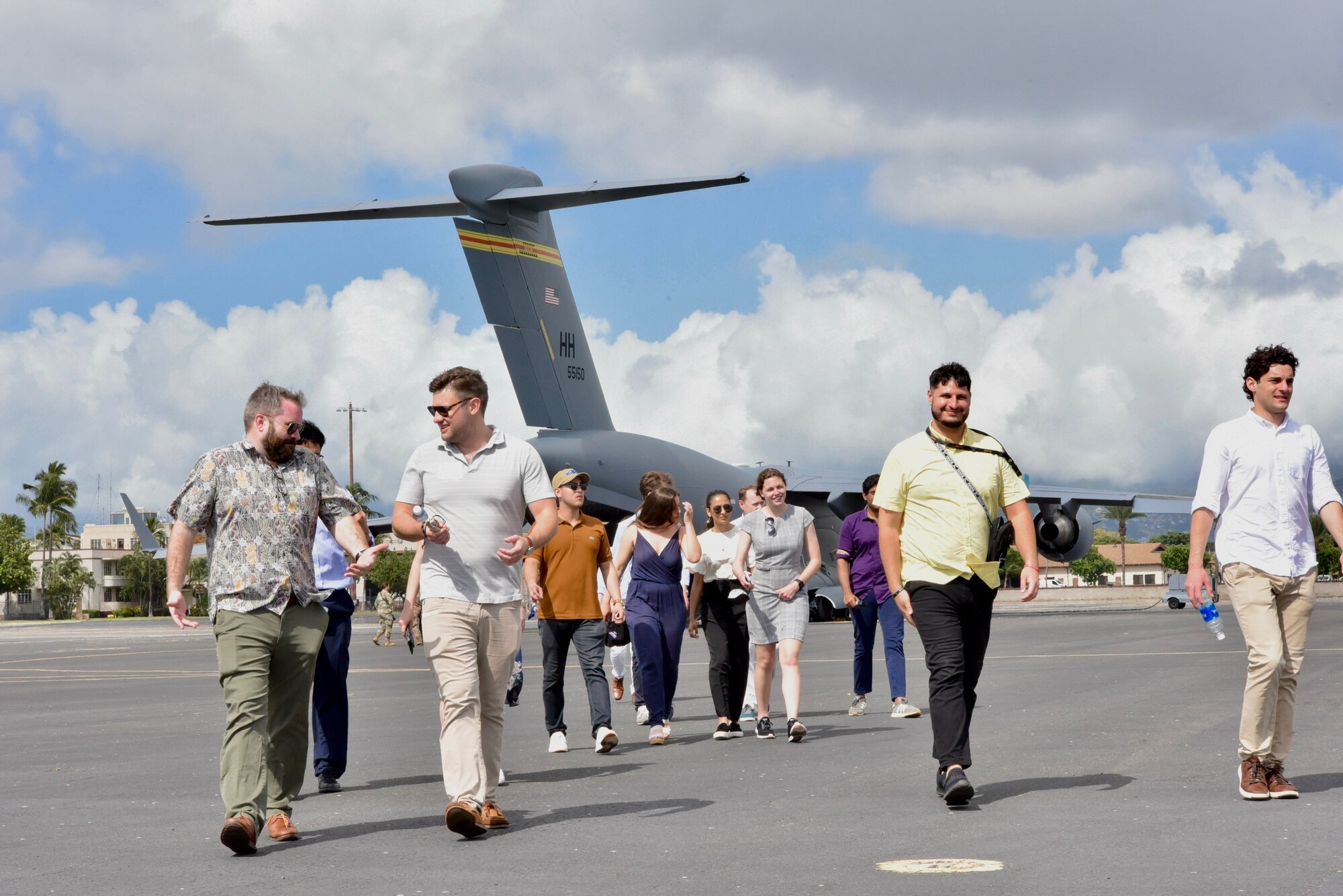 Students from the Duke University Grand American Strategy Program transit away from a C-17 Globemaster III static display after talking with Airmen as part of a base visit at Joint Base Pearl Harbor-Hickam, Hawaii, March 10, 2022. The Duke University Program in American Grand Strategy is a signature program for Duke students interested in national security policymaking.
(U.S. Air Force photo by 1st Lt. Benjamin Aronson)