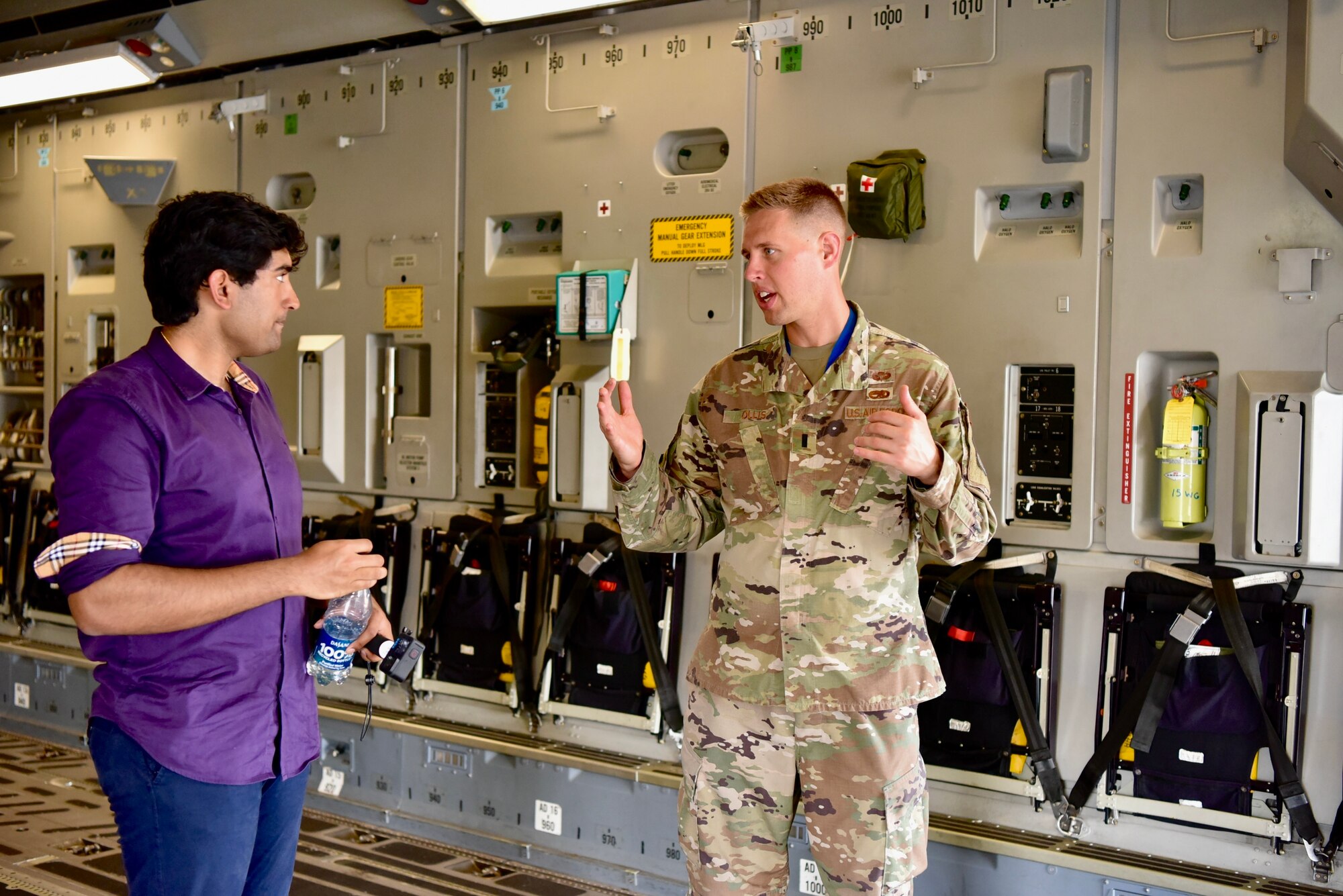 1st Lt. Seth Ollis, 15th Aircraft Maintenance Squadron officer in charge, discusses C-17 Globemaster III capabilities to a student from the Duke University Grand American Strategy Program as part of a base visit at Joint Base Pearl Harbor-Hickam, Hawaii, March 10, 2022. Students had the opportunity to tour a C-17, a KC-135, and an F-22 static while touring JBPHH to learn more about its role in the Indo-Pacific.
(U.S. Air Force photo by 1st Lt. Benjamin Aronson)