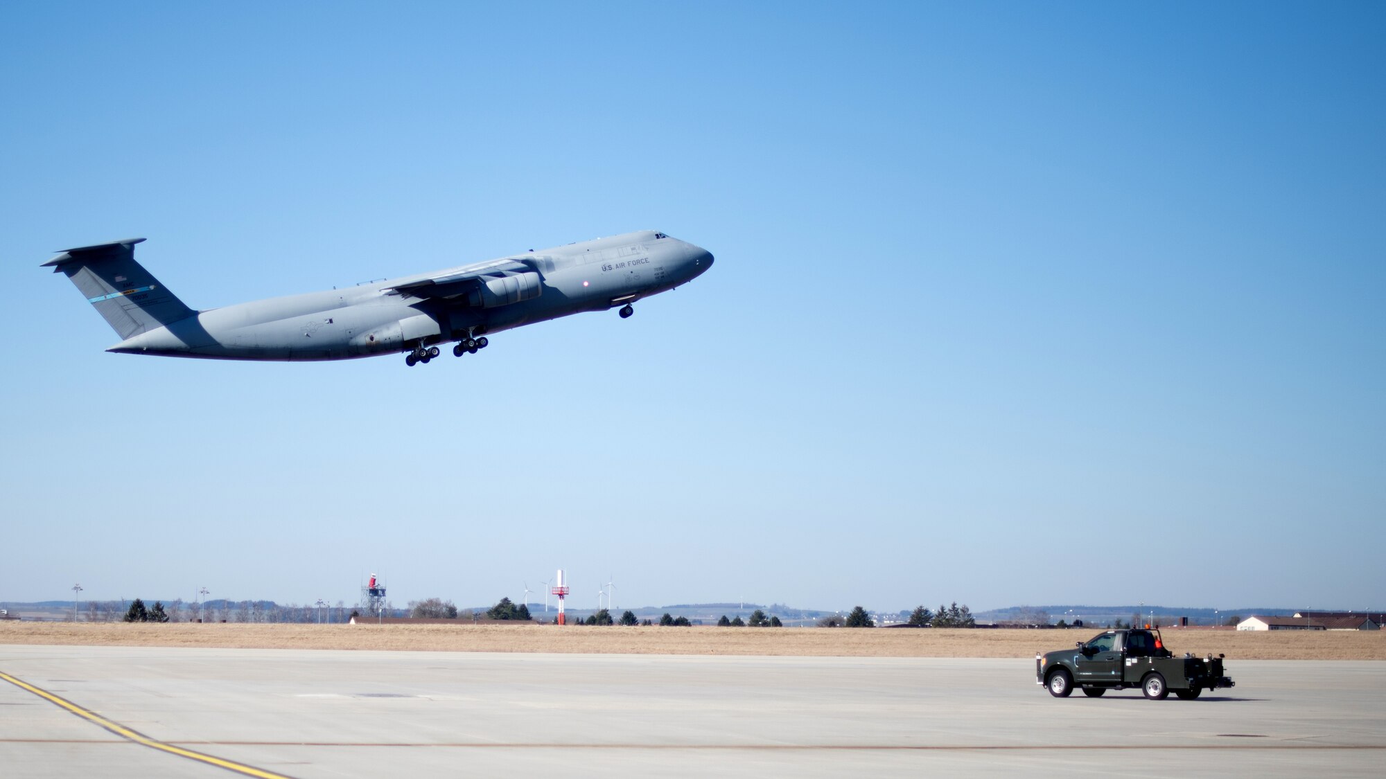 A U.S. Air Force C-5M Super Galaxy aircraft takes off from  Spangdahlem Air Base, Germany, Mar. 7, 2022