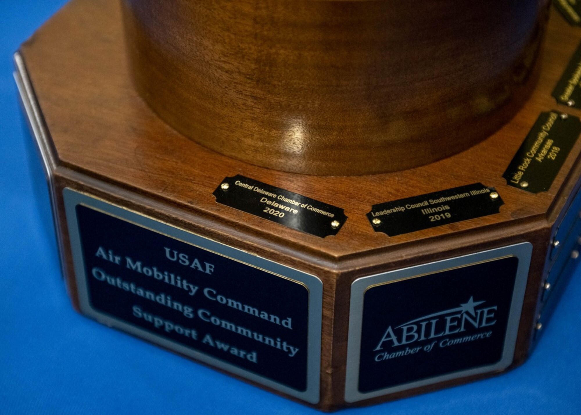 The U.S. Air Force Air Mobility Command Outstanding Community Support Award, also known as the Abilene Trophy, sits during The Military Affaire in Dover, Delaware, March 10, 2022. The Abilene Trophy was established in 1999 to recognize the community that best supports an Air Mobility Command base each calendar year. The Abilene Trophy was given to the Central Delaware Chamber of Commerce’s Military Affaire Committee as a way to feature the outstanding support they provide Airmen, their families and the combat airlift mission. The CDCC MAC has won the trophy five times. (U.S. Air Force photo by Tech. Sgt. J.D. Strong II)