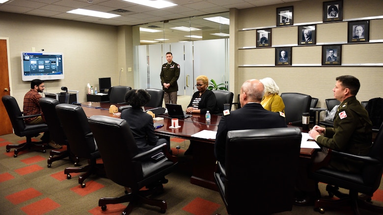 LTC. Joseph Sahl delivers his opening remarks, kicking off the Small Business Industry Day virtual event. (Pictured from left to right) LTC. Nathan Branen, deputy district commander, U.S. Army Corps of Engineers, Nashville District; Eulanda Scott-Shingleton, chief, Small Business Office, U.S. Army Corps of Engineers, Nashville District; Steph Hall, deputy district engineer, U.S. Army Corps of Engineers, Nashville District; LTC. Joseph Sahl, commander, U.S. Army Corps of Engineers, Nashville District; COL. Sebastien Joly, commander, U.S. Army Engineering and Support Center, Huntsville; and Brandi Dennis, deputy director, Installation Support and Programs Management, Huntsville; Joseph Rini, Visual Information specialist U.S. Army Corps of Engineers, Nashville District (USACE Photo by HEATHER KING)