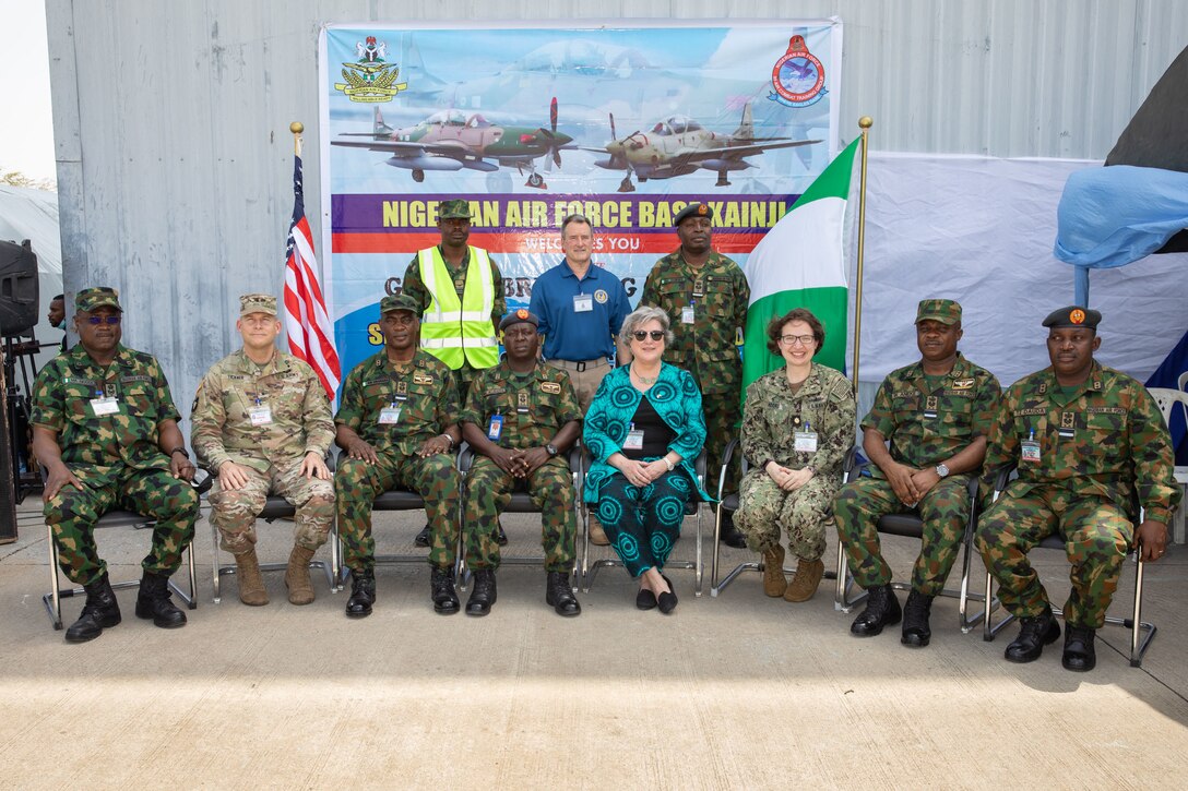 Nigerian Air Force, U.S. Army Corps of Engineers, U.S. Embassy and U.S. Air Force Security Assistance and Cooperation Directorate partners pose at Kainji Air Force Base in Nigeria February 15, 2022. The officials participated in a groundbreaking ceremony highlighting the ongoing construction of support facilities for recently delivered A-29 Super Tucano aircraft. The construction is a part of the historic $500 million U.S. foreign military sale to Nigeria, which also includes the delivery of the 12 A-29 Super Tucano aircraft, munitions, and training. (Photo Courtesy of the U.S. Embassy in Nigeria)