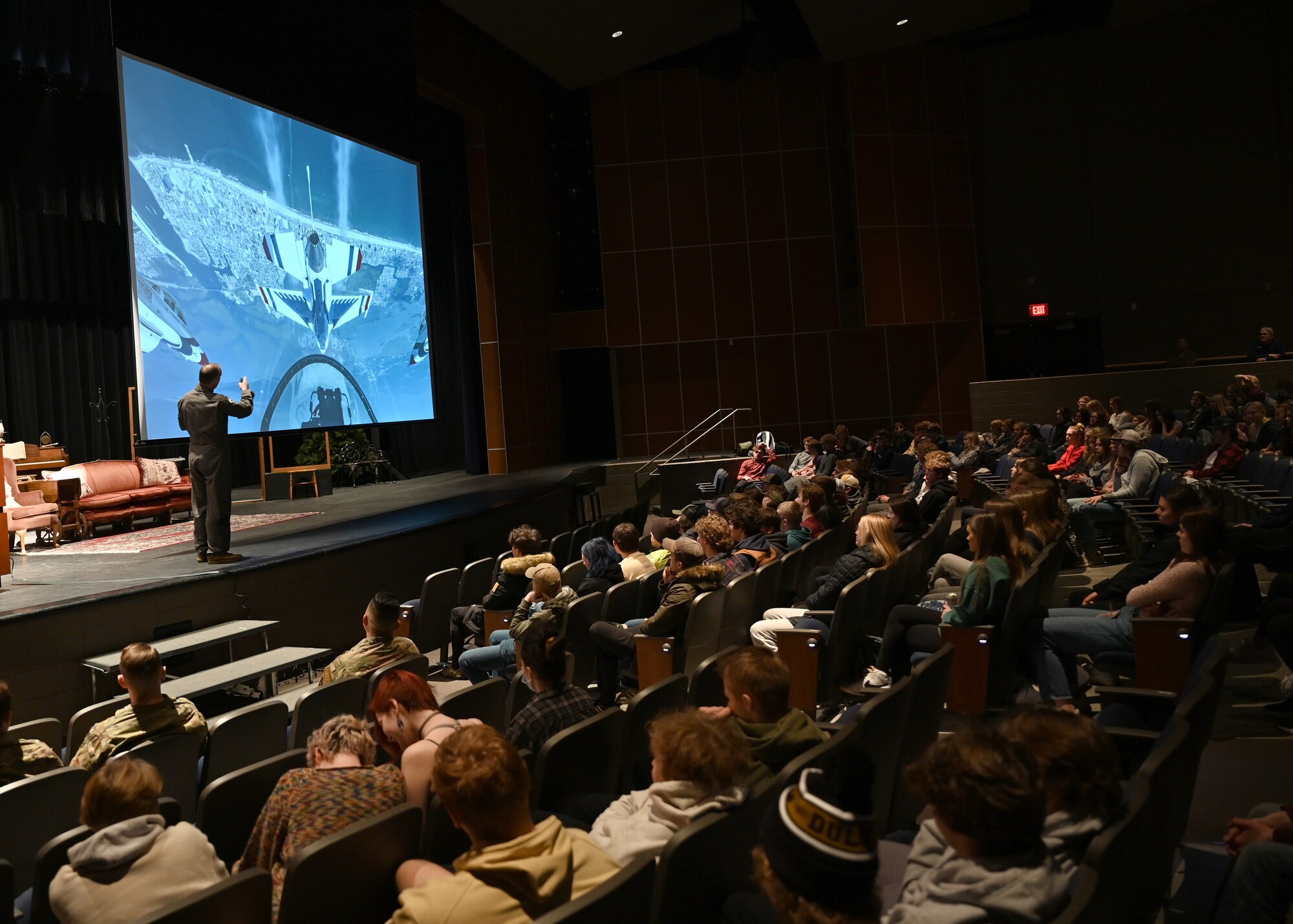 Lt. Gen. Scott Pleus, Seventh Air Force commander, briefs a group of students from Hermantown High School about the teamwork and trust between U.S. Air Force Thunderbird pilots on March 7, 2022 in Hermantown, Minn. Pleus explained that the Thunderbird Demo Team flies roughly six inches apart and pilots focus solely on the lead plane for direction, putting all their trust in the lead pilot. (U.S. Air Force photo by Tech. Sgt. Jessica Kind/Released)