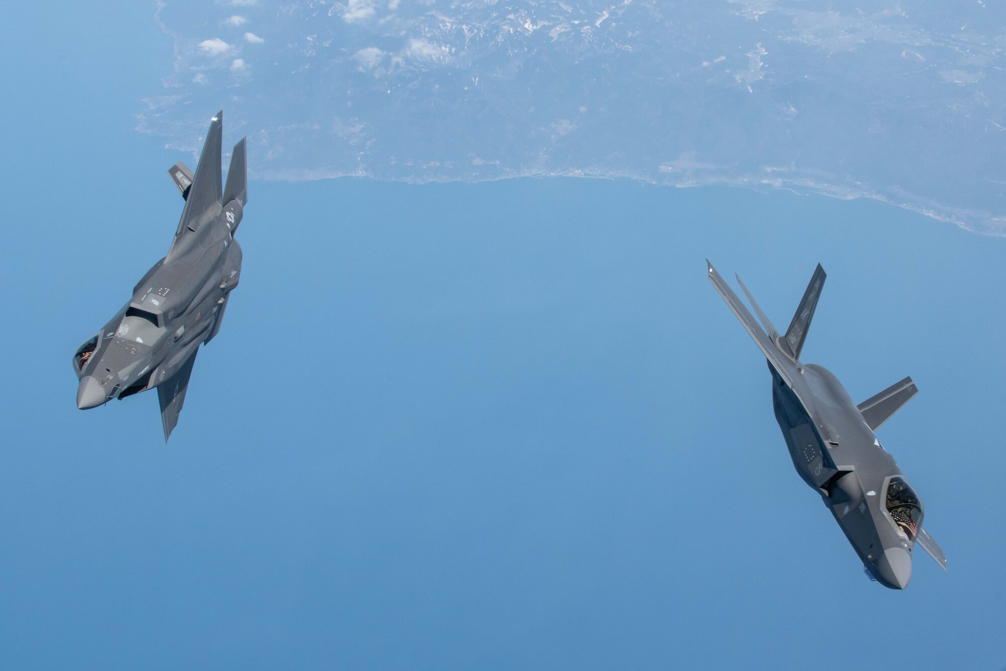 Two jets depart form an aircraft