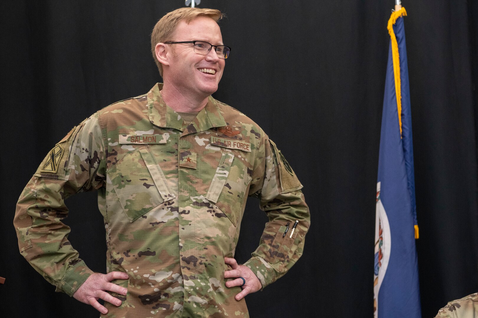 Brig. Gen. Bryan E. Salmon, the Assistant Adjutant General for ANG Strategic Initiatives, stands with his hands on his hips as he addresses members of the 856th Cyber Protection Team at an end of mobilization ceremony Feb. 25, 2022, in Hampton, Virginia.