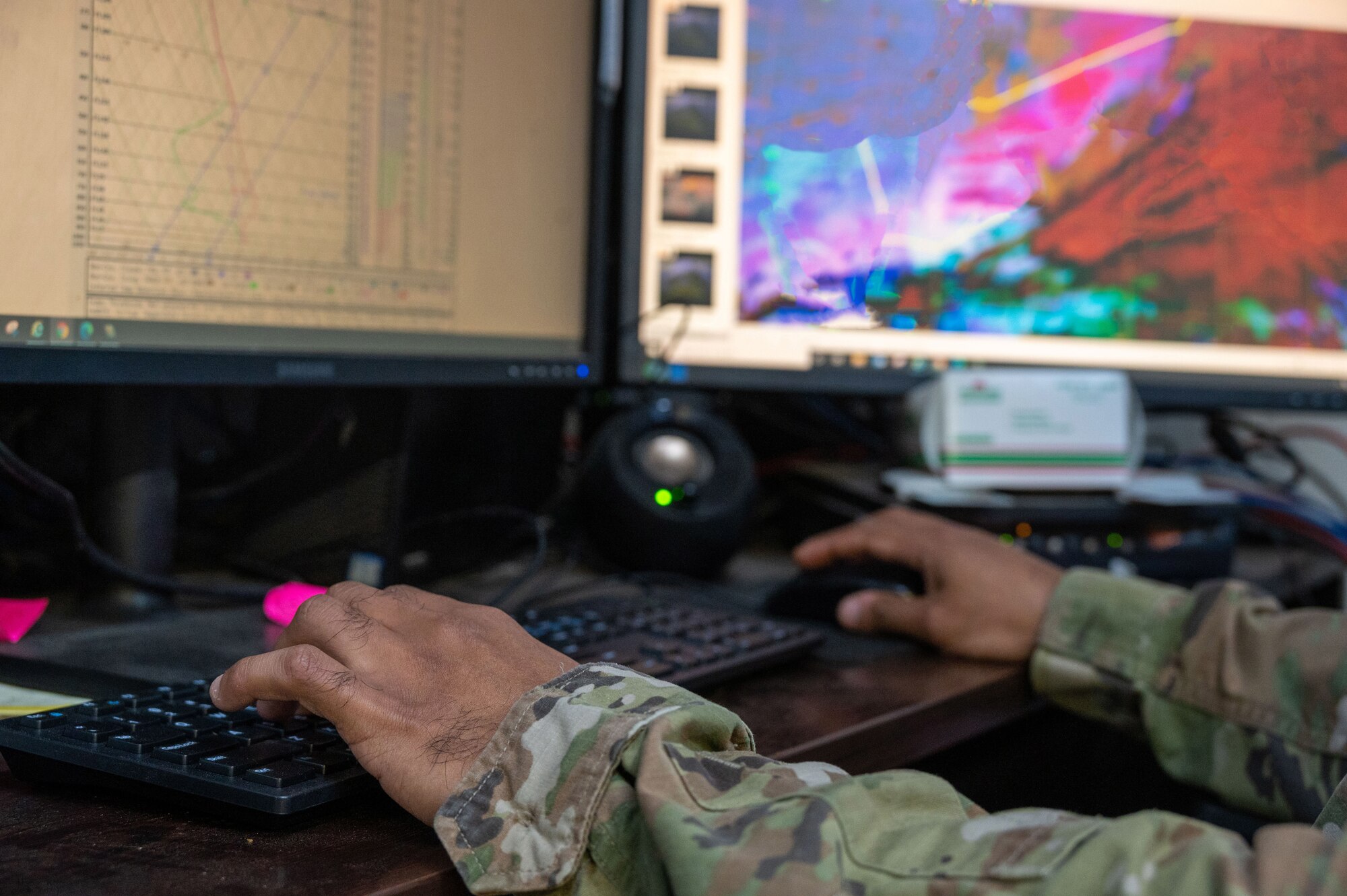 A 332d Expeditionary Operations Support Squadron Weather Flight technician observes weather graphics at an undisclosed location in Southwest Asia, March 3, 2022. The 332d EOSS Weather Flight delivers customized meteorological support for the 332d Air Expeditionary Wing's varied structural and agency sensitivities.
(U.S. Air Force photo by Tech. Sgt. Lauren M. Snyder)(This photo has been altered for operational security purposes.)