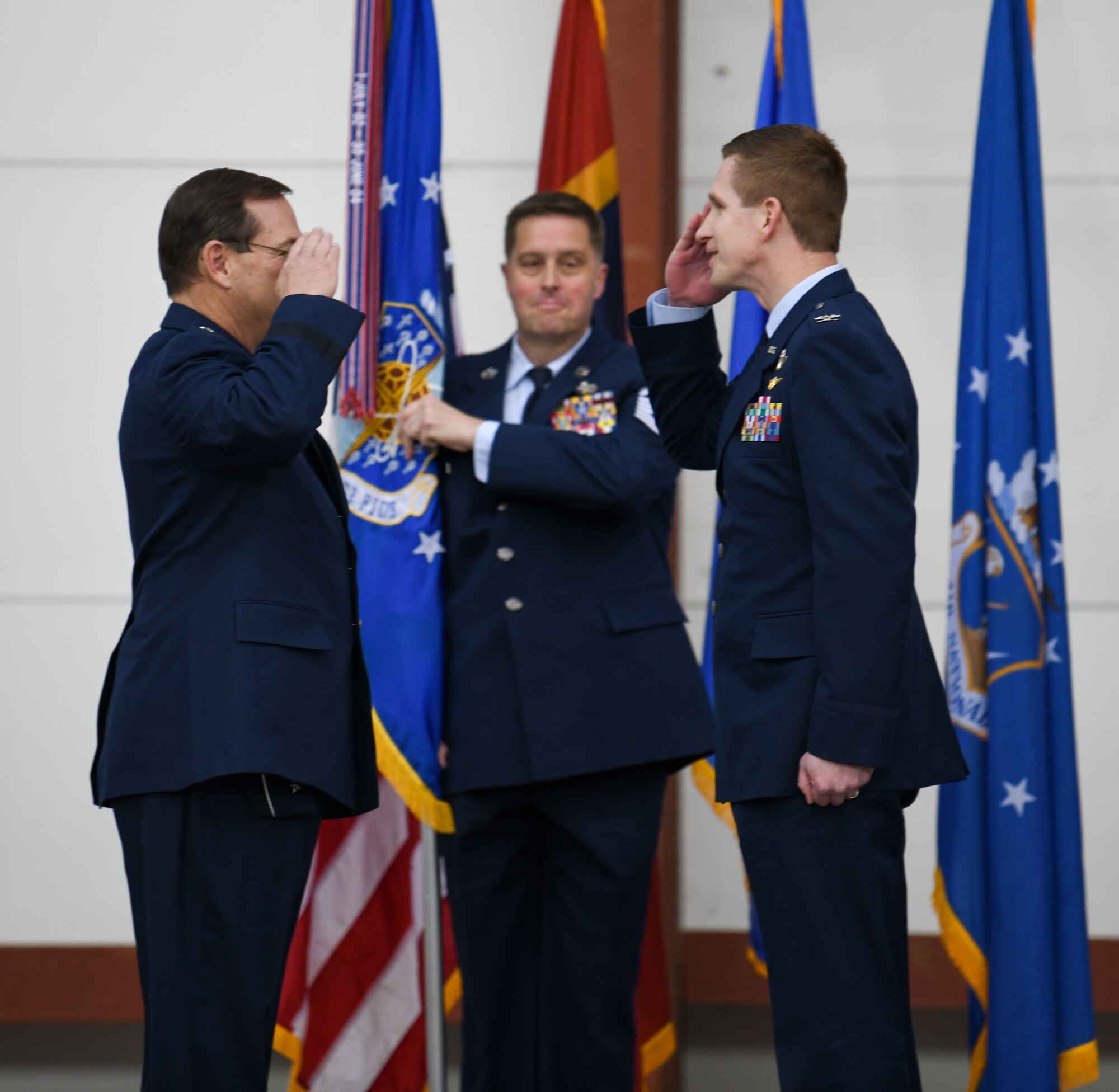 Maj. Gen. Billy M. Nabors, assistant adjutant general and commander, Mississippi Air National Guard, Command Chief Master Sgt. John Myers, senior enlisted advisor to the wing commander, and Col. Britt A. Watson, incoming commander of the 172nd Airlift Wing, participate in a change of command ceremony at Thompson Field, Jackson, Mississippi, Feb. 6, 2022.