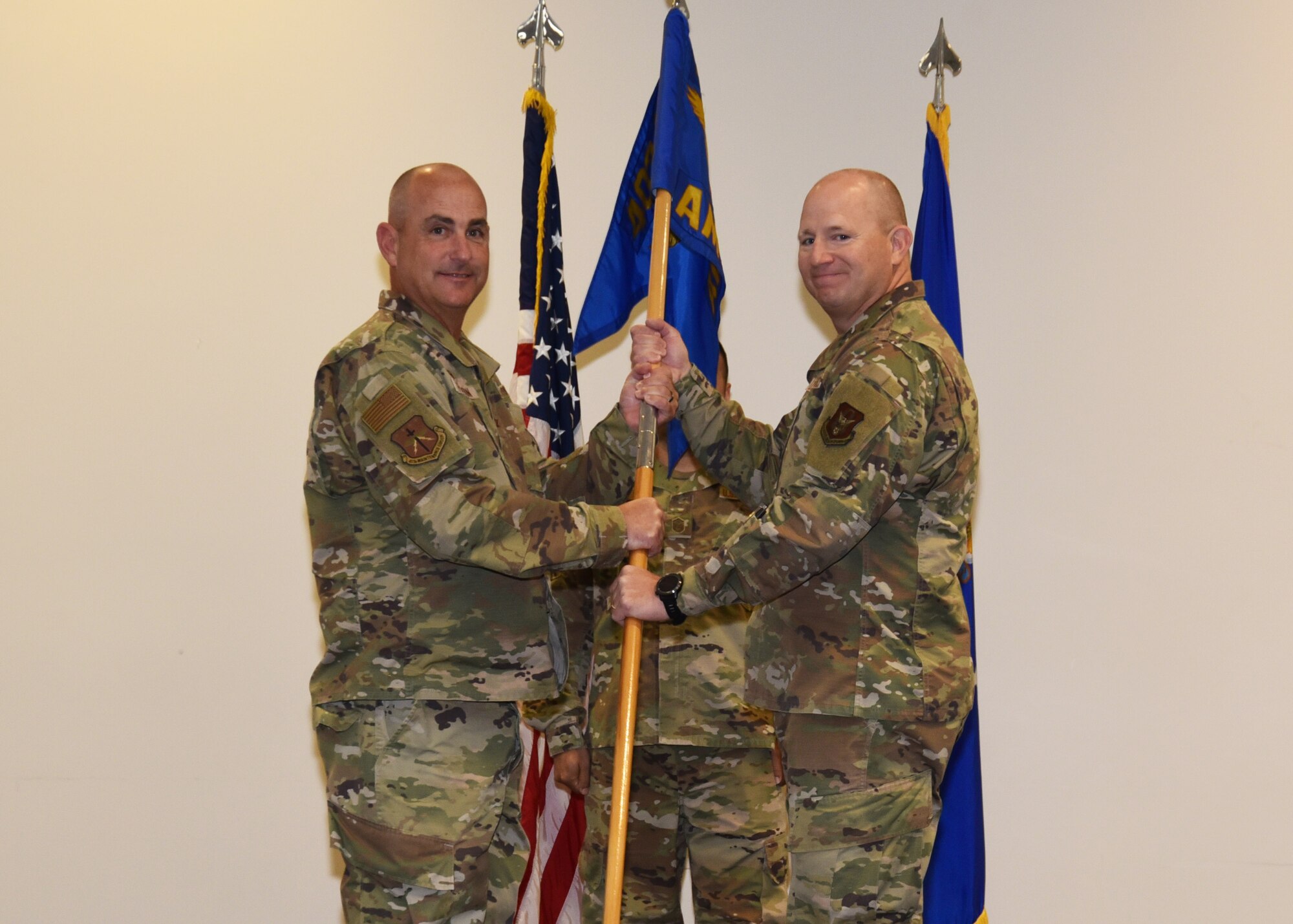 Col. Fortson hands guidon to Lt. Col. Weed