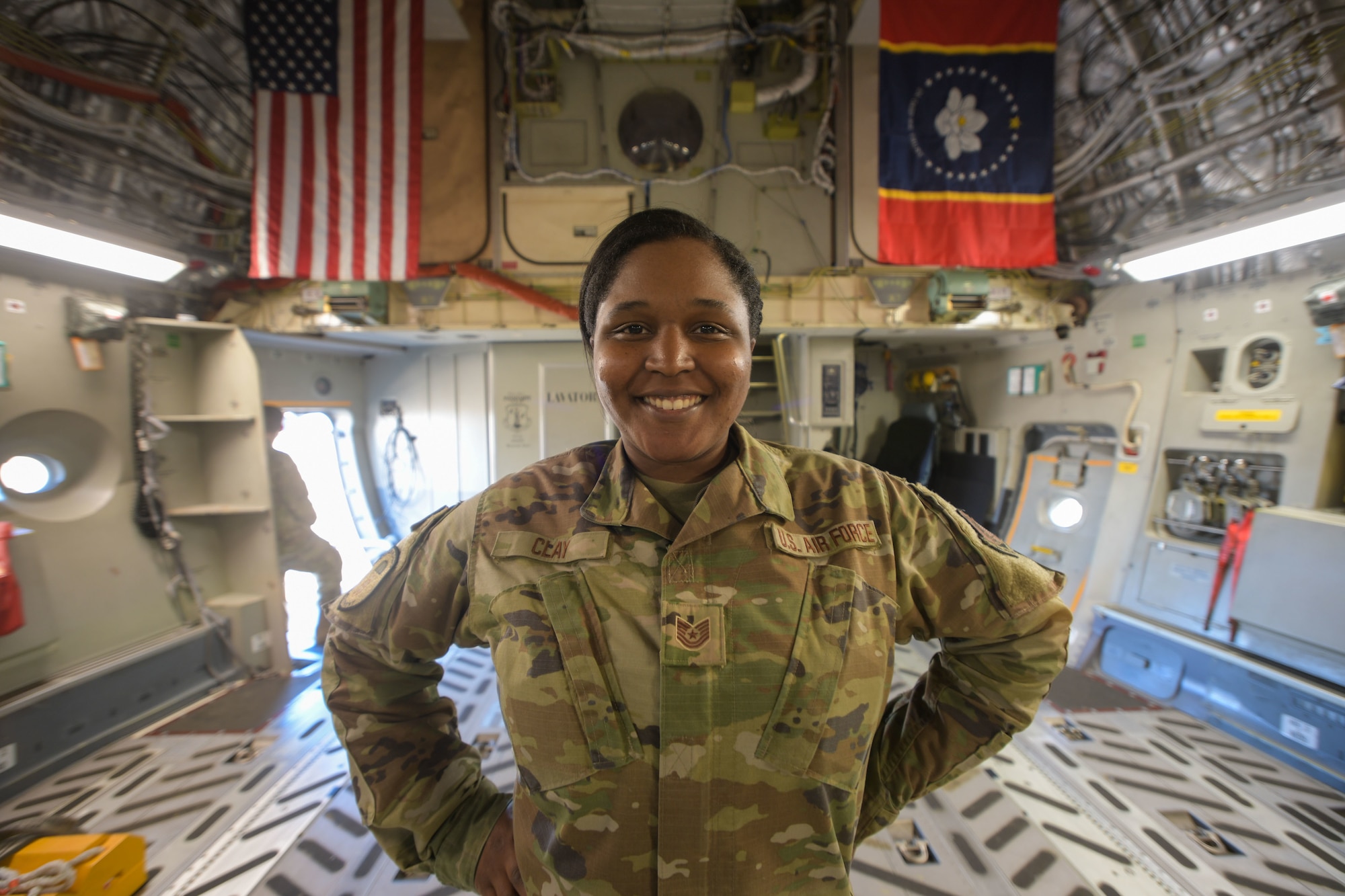 Tech. Sgt. Asia Clay, an aircrew flight equipment technician with the 172nd Operations Support Squadron, Jackson, Mississippi, stands aboard a C-17 Globemaster III, Feb 15, 2022.