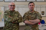 From left, Command Sgt. Maj. Michael Thibodeau and Capt. Jacob Ricciotti of Joint Task Force Winter Surge pose at the Edward Cross Training Center in Pembroke on March 2, 2022.