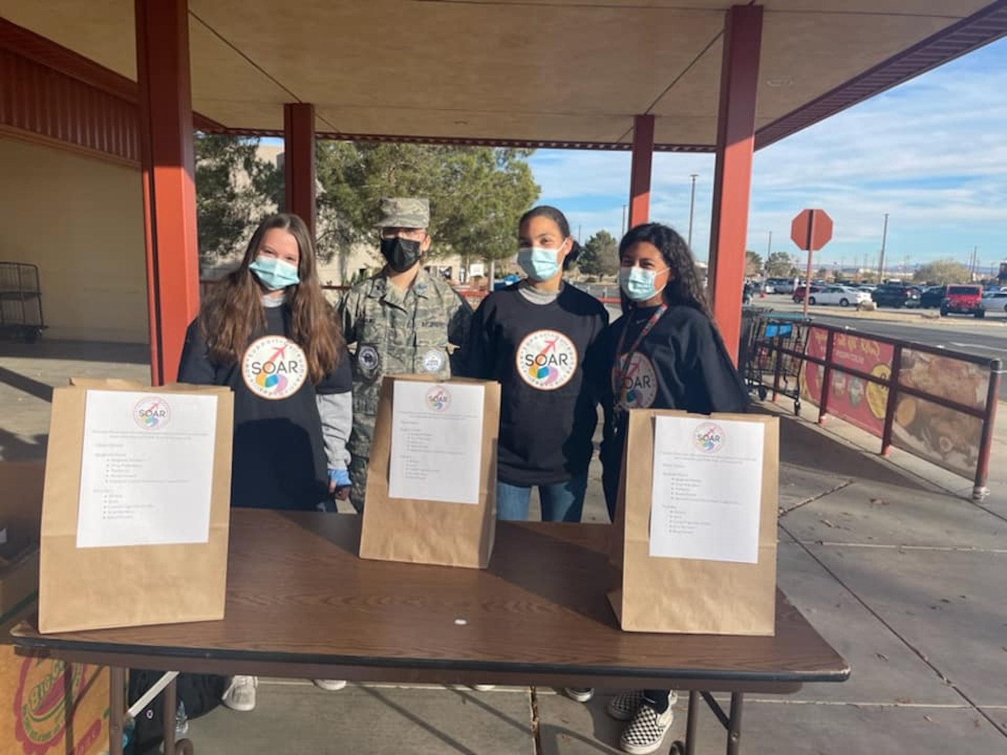 SOAR members sponsored local food drive that supported young Airmen in the dorms and a non-profit food bank in the surrounding community to the base.