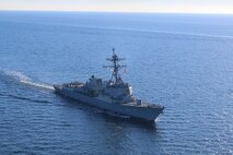 The Arleigh Burke-class guided-missile destroyer USS Forrest Sherman (DDG 98) conducts maneuvering drills in the Baltic Sea, March 9. Forrest Sherman is deployed to the European theater of operations and participating in a range of maritime activities in support of U.S. Sixth Fleet and NATO Allies. (U.S. Navy photo by Naval Air Crewman (Helicopter) 2nd Class Reuben Richardson)