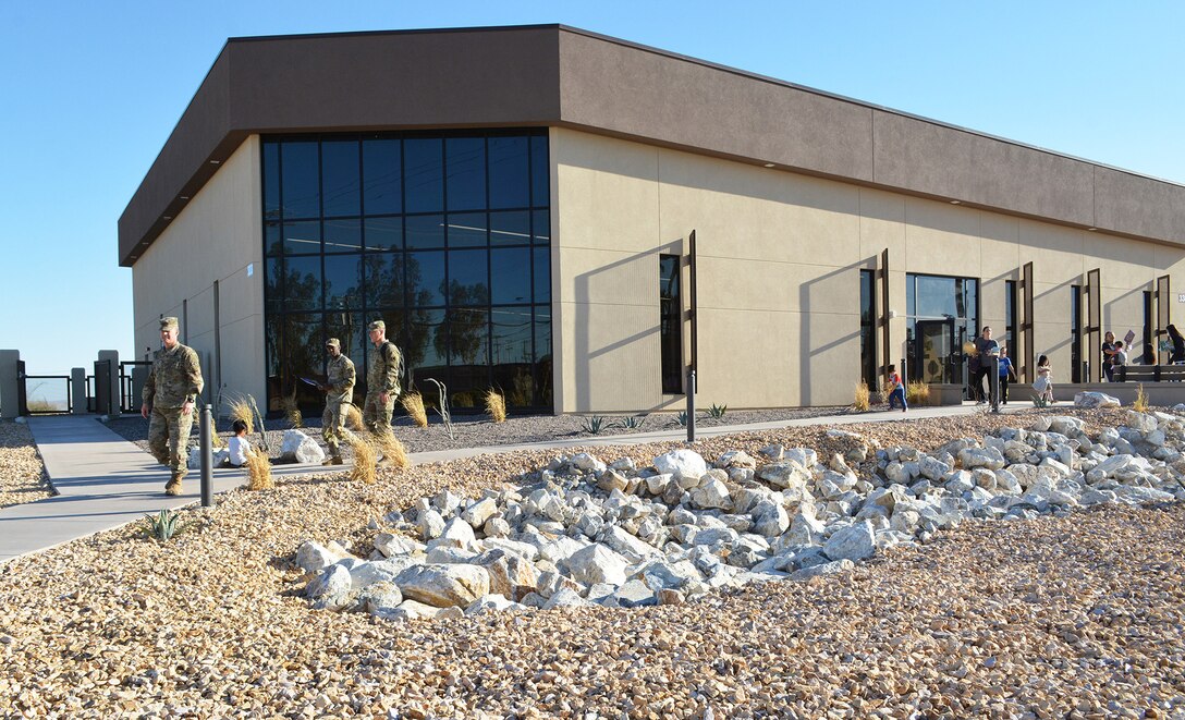 Brig. Gen Curt Taylor, commanding general of the National Training Center at Fort Irwin, leaves the new Fort Irwin Library March 9 following a ribbon-cutting ceremony signifying the grand opening of the facility. The Corps’ LA District managed construction of the $6-million facility, which replaces a more than 25-year-old library on the installation. The new library is energy-efficient and LEED-Silver certified. Like many of the other facilities the Corps has built at Fort Irwin, the landscape around the library incorporates low-volume irrigation methods and xeriscaping techniques.