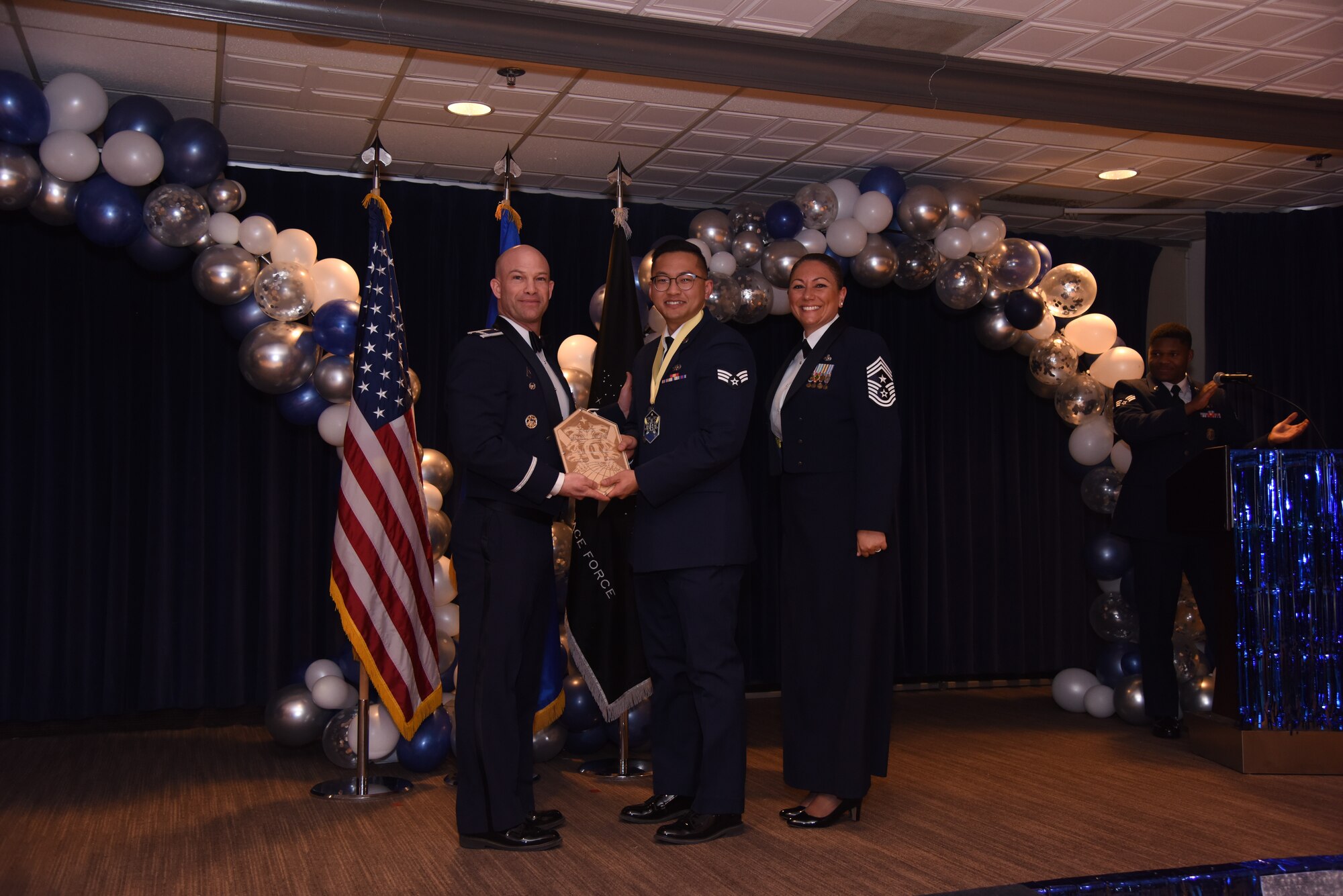 U.S. Air Force Senior Airman Christopher Thao, 50th Communications Squadron receives the Peterson-Schriever Garrison Airman of the Year award at Peterson Space Force Base, Colorado, Mar. 11, 2022.