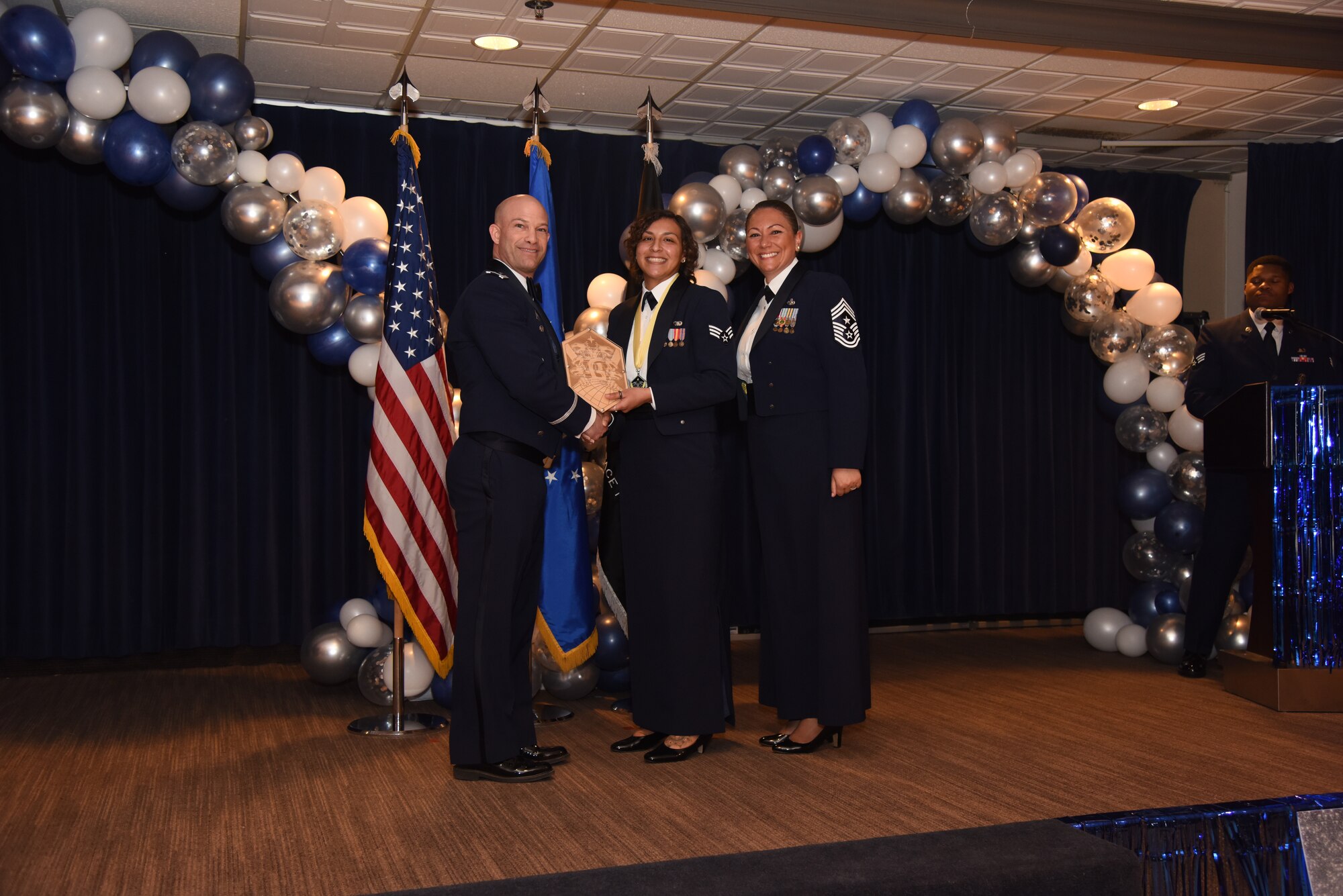 U.S. Space Force Specialist 4 Honesty Davis, 21st Communications Squadron, receives the Peterson-Schriever Garrison Junior Enlisted Member of the Year award at Peterson Space Force Base, Colorado, Mar. 11, 2022.