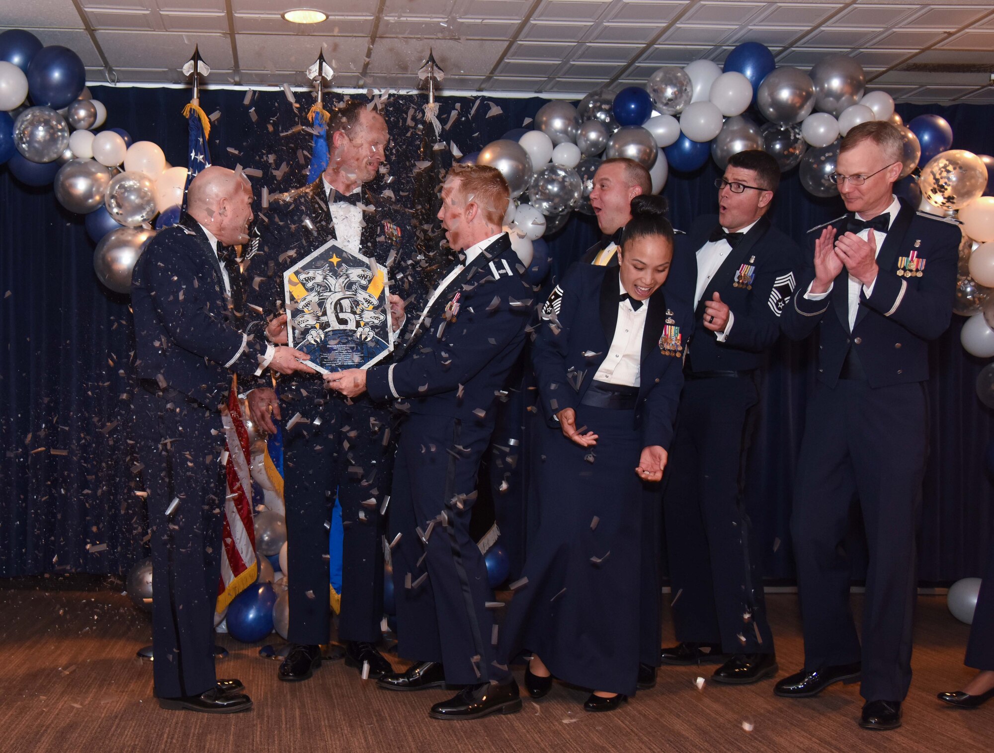 The Peterson-Schriever Garrison Annual Award for the Small Team of the Year is presented to the 21st Operational Medical Readiness Squadron/ Pandemic team at Peterson Space Force Base, Colorado, Mar. 11, 2022.