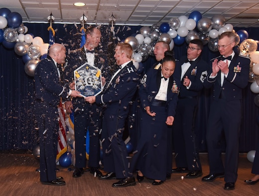 The Peterson-Schriever Garrison Annual Award for the Small Team of the Year is presented to the 21st Operational Medical Readiness Squadron/ Pandemic team at Peterson Space Force Base, Colorado, Mar. 11, 2022.