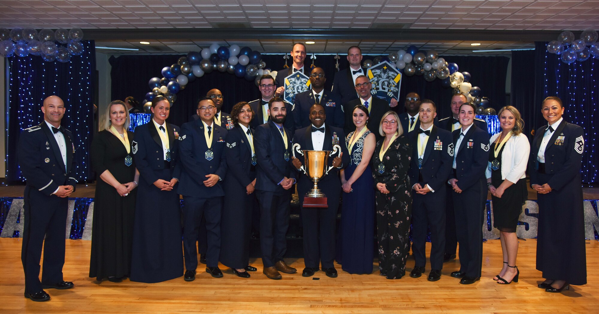 Annual award winners stand for a group photo in the Peterson Hub, at Peterson Space Force Base, Colorado, Mar. 11, 2022.