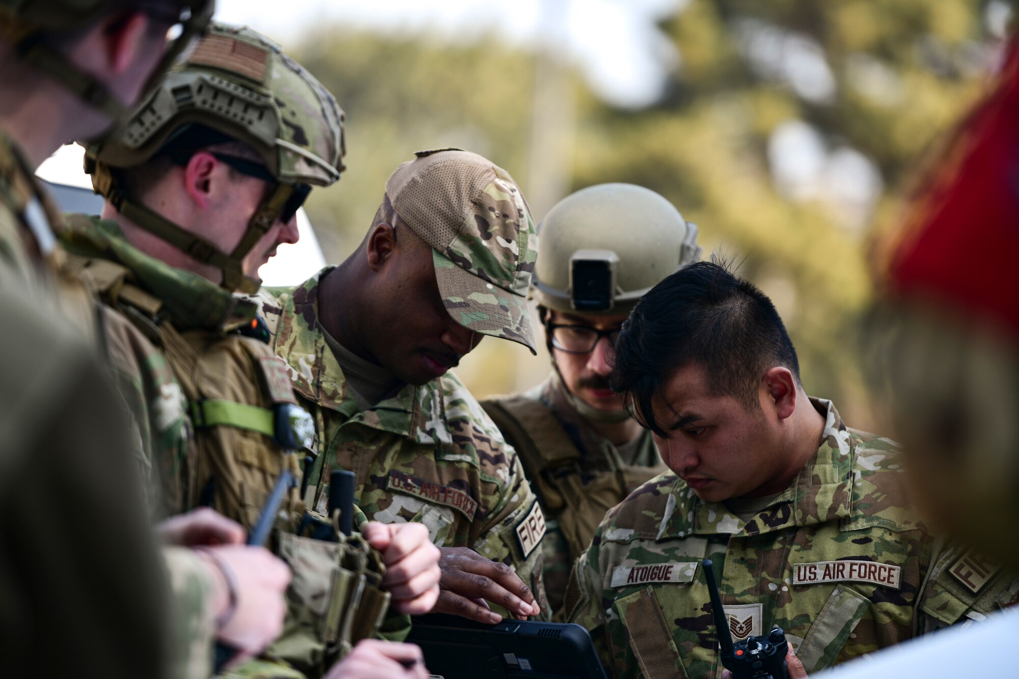Airmen communicate during training.