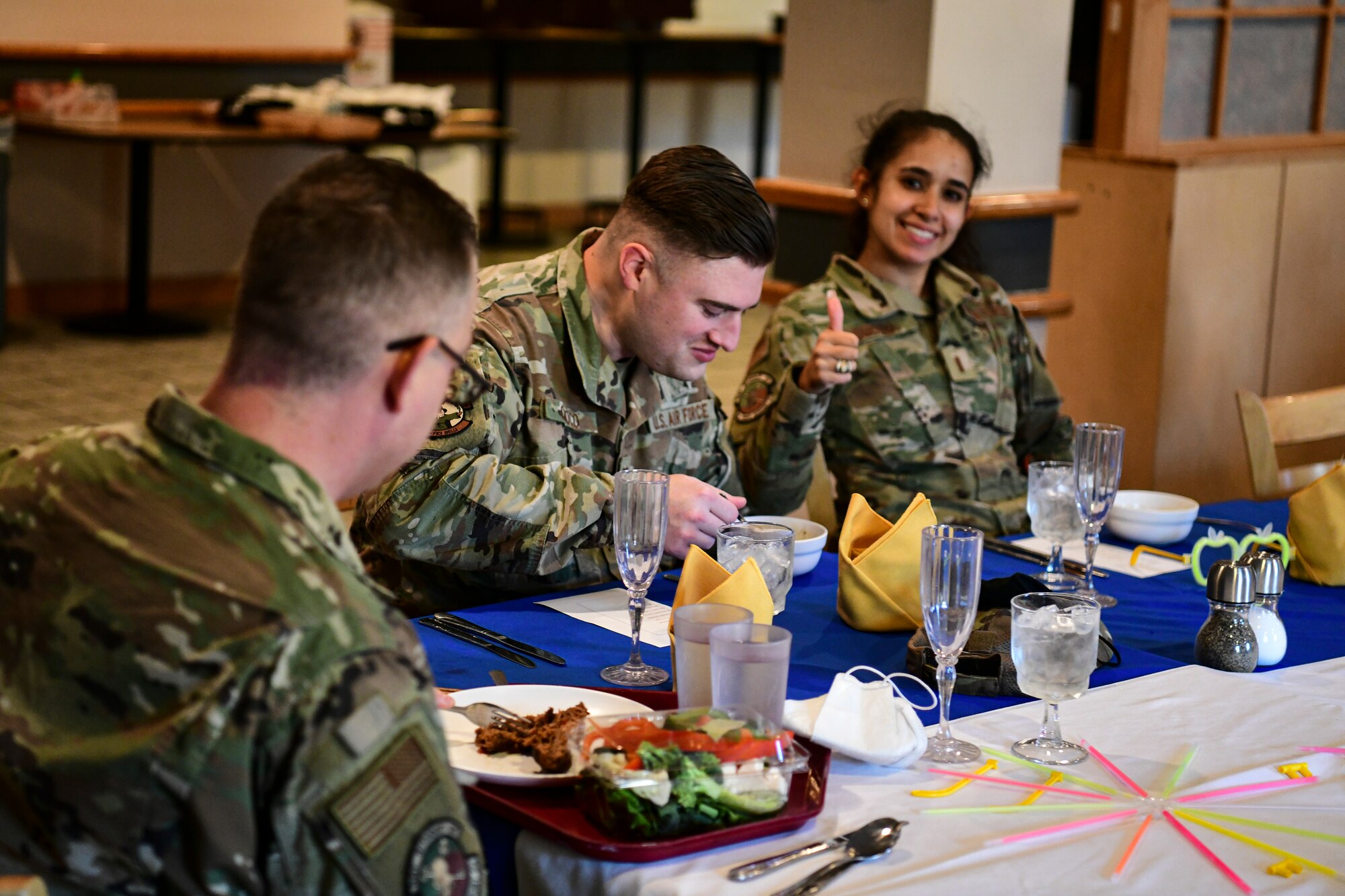 Airmen enjoy a meal.