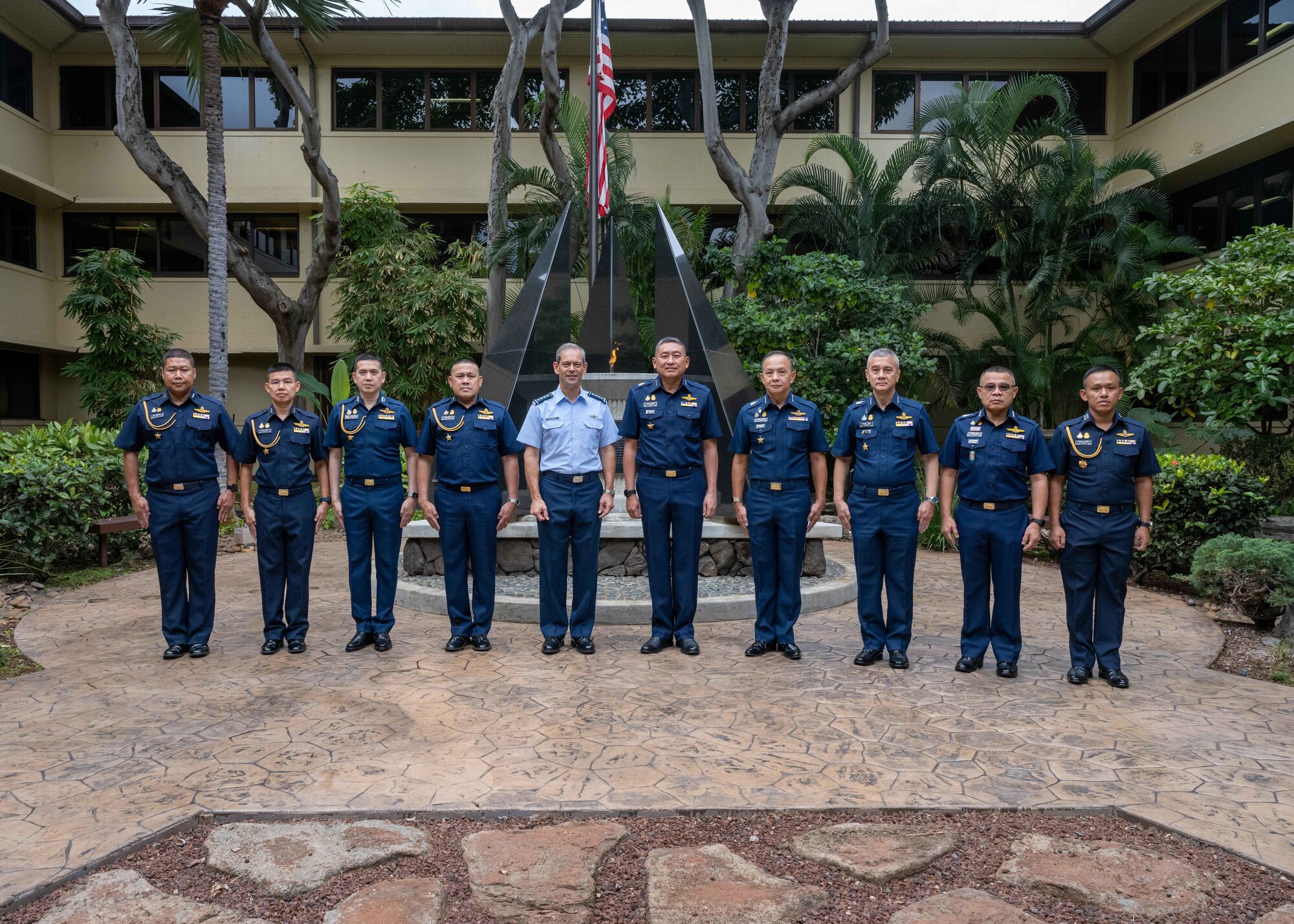 Royal Thai Air Forces Command-in-Chief stands with the commander of Pacific Air Forces and his Royal Thai Air Forces delegation.