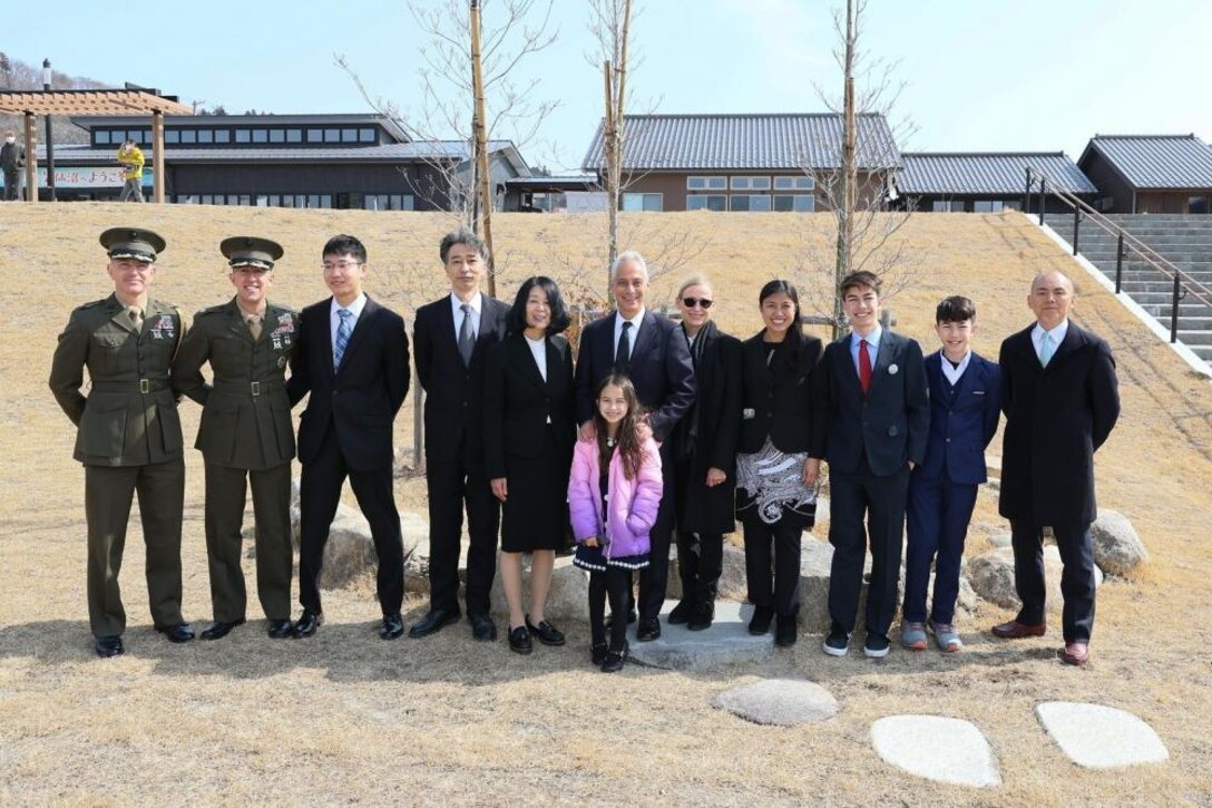 The U.S. Ambassador to Japan Rahm Emanuel, Marines of the 3rd Marine Expeditionary Brigade and U.S. Embassy Tokyo, along with family members and survivors of the 3.11.11 Great East Japan Earthquake, tsunami and nuclear disaster visit a memorial in Oshima dedicated to the relationship between the residents of the island and the U.S. Marine Corps in Kesennuma, Oshima, Japan March 11, 2022. The visit marked the 11-year anniversary of the disaster and subsequent relief response Operation Tomodachi. (Courtesy photo by U.S. State
Dept. photographer)