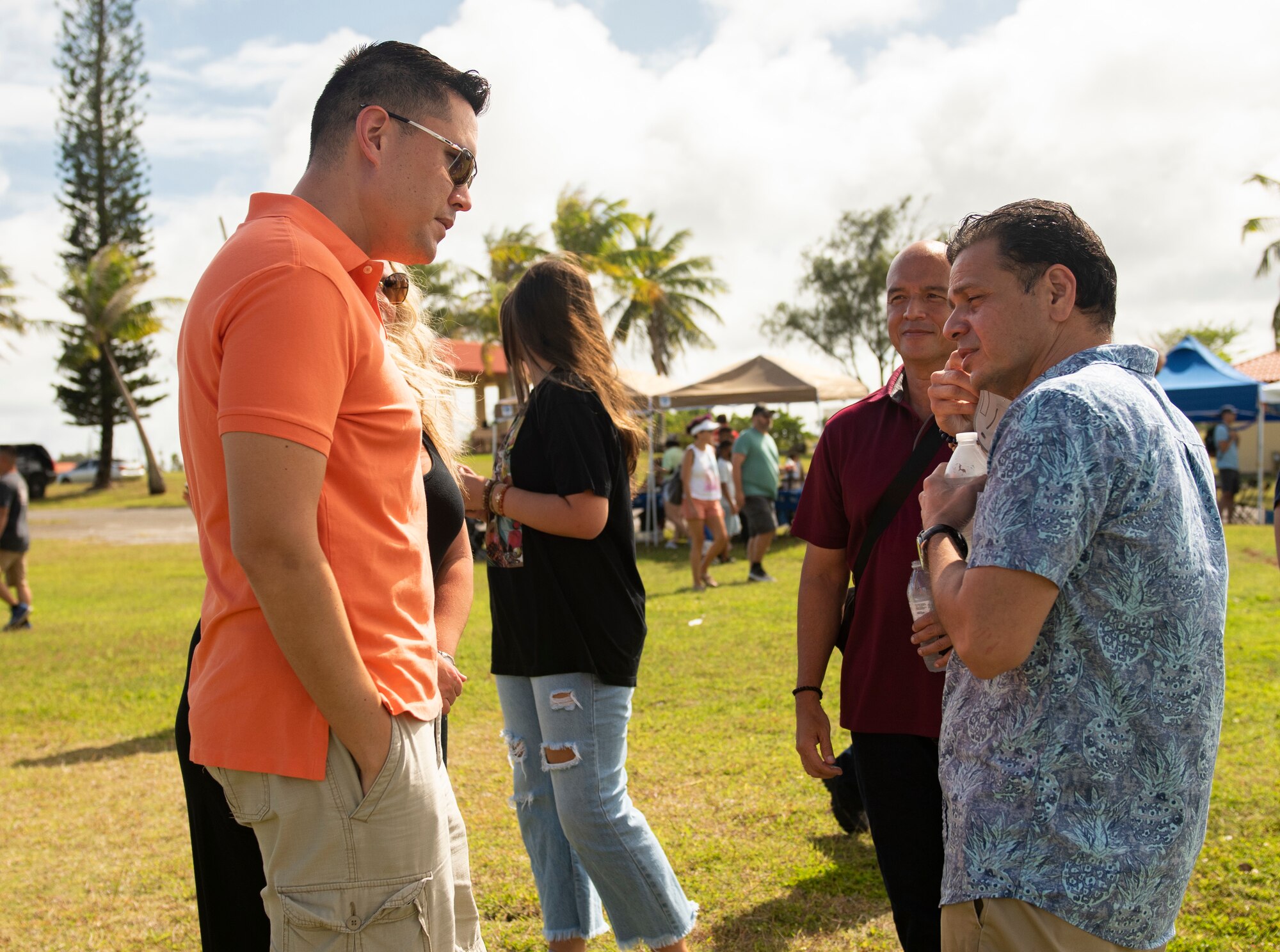 U.S. Air Force Col. David Aragon, left, 36th Wing vice commander, speaks with John Perez, a descendant of Guam’s founding members of the Perez clan, during the annual Tao Tao Guahan event March 12, 2022, at Andersen Air Force Base, Guam. The event focused on immersing Team Andersen members in the local culture of Guam and strengthen the partnerships of the two communities. The event included booths, cultural music and dance, storytelling, food and more. (U.S. Air Force Photo by Senior Airman Helena Owens)