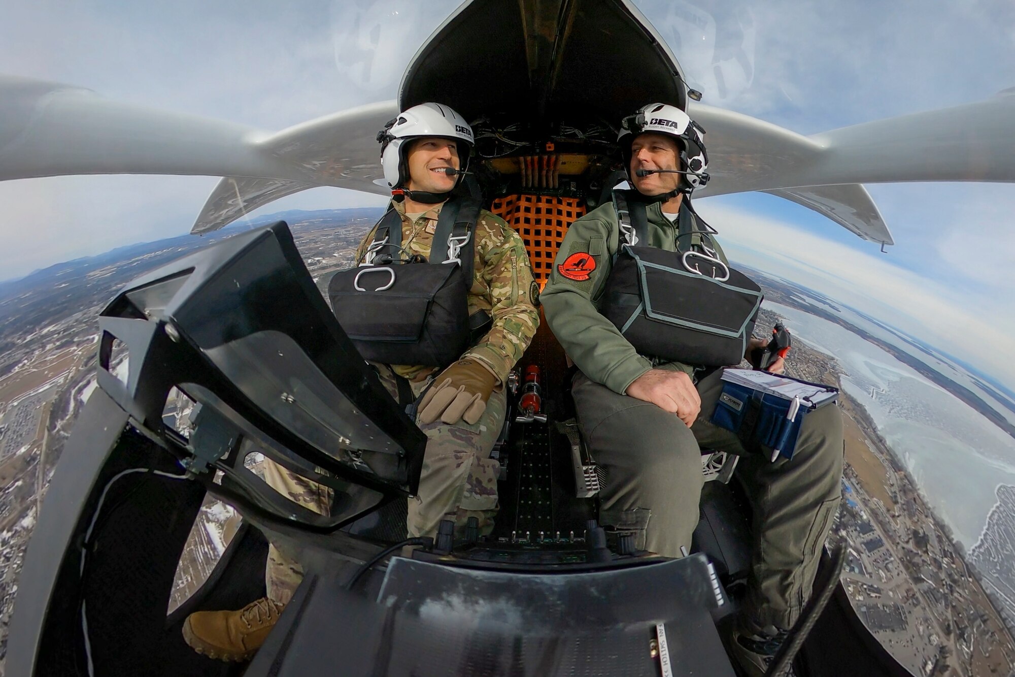 Maj. Jonathan Appleby, left, and BETA test pilot Camron Guthrie in the ALIA cockpit, mid-flight test. (BETA Technologies photo/ Brian Jenkins)
