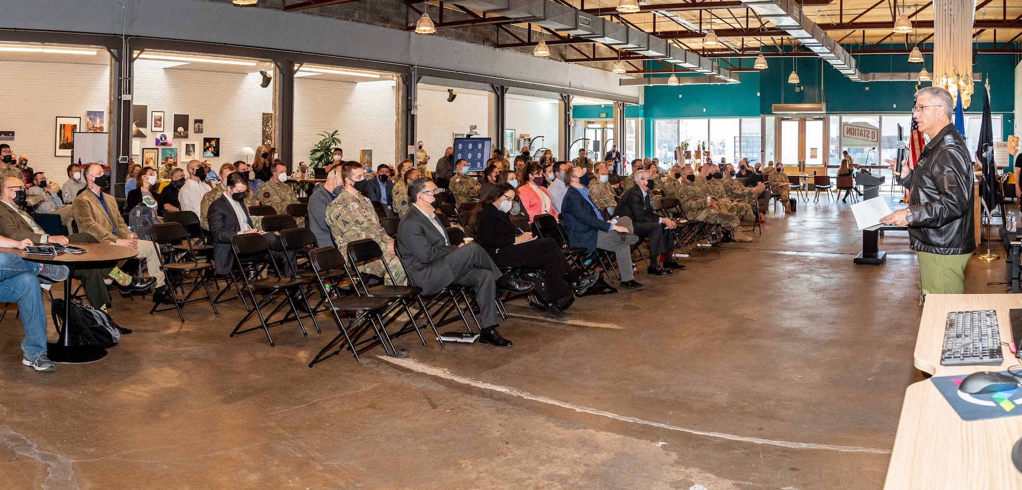 Brig. Gen. Kevin Whale, Deputy Commanding General of Transformation, Space Operations Command, gives the keynote presentation at the opening session of the Delta Innovation Summit held at the Q Station collaboration hub in Albuquerque, N.M. in February. (U.S. Air Force photo/Allen Winston)