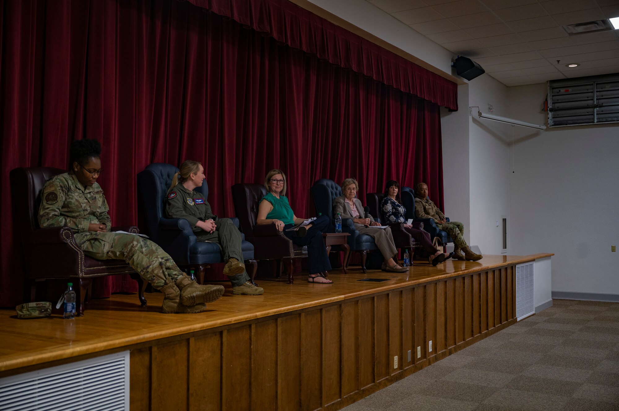 Team McChord Women’s History Month panel members discuss their experience at Joint Base Lewis-McChord, Wash., March 10, 2022. The WHM panel encouraged the audience to ask questions and create discussion with the speakers. (U.S. Air Force photo by Airman 1st class Charles Casner)