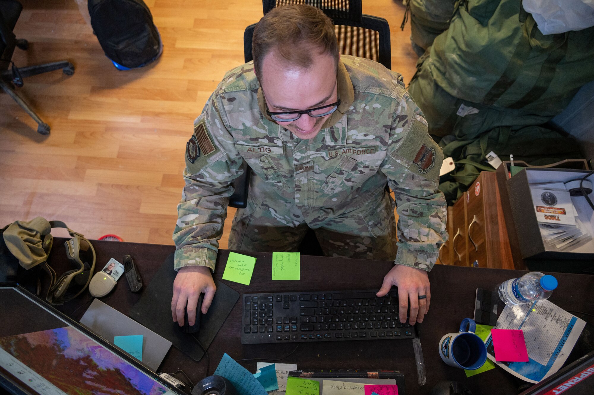 U.S. Air Force Staff Sgt. Matthew Altig, 332d Expeditionary Operations Support Squadron Weather Flight technician, observes a satellite loop at an undisclosed location in Southwest Asia, March 3, 2022. The 332d EOSS Weather Flight delivers customized meteorological support for the 332d Air Expeditionary Wing's varied structural and agency sensitivities.
(U.S. Air Force photo by Tech. Sgt. Lauren M. Snyder)(This photo has been altered for operational security purposes.)