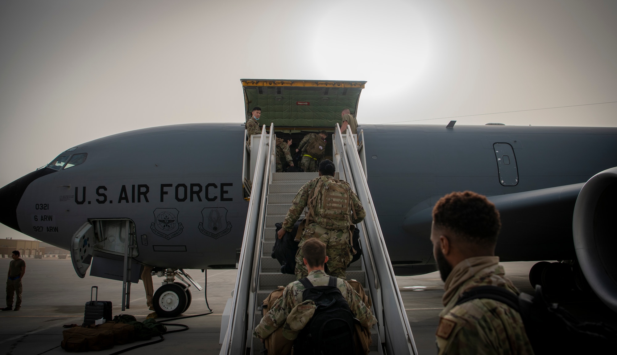 Airmen board a KC-135.