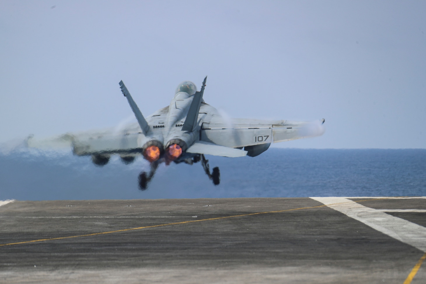PHILIPPINE SEA (March 15, 2022) An F/A-18F Super Hornet, assigned to the "Black Aces" of Strike Fighter Squadron (VFA) 41, launches from the flight deck of the Nimitz-class aircraft carrier USS Abraham Lincoln (CVN 72). Abraham Lincoln Strike Group is on a scheduled deployment in the U.S. 7th Fleet area of operations to enhance interoperability through alliances and partnerships while serving as a ready-response force in support of a free and open Indo-Pacific region. (U.S. Navy photo by Mass Communication Specialist 3rd Class Javier Reyes)