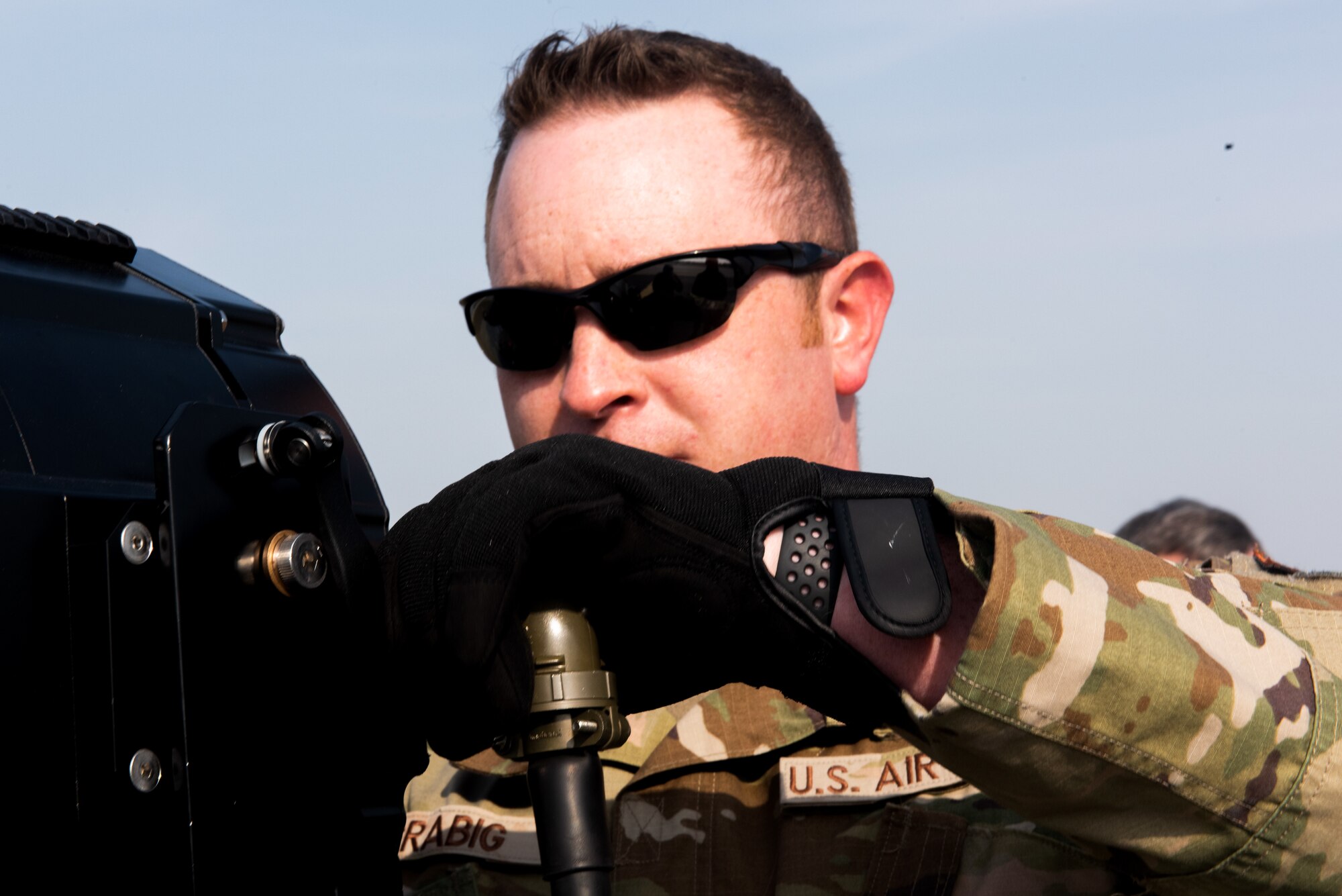 Tech Sgt. Joshua Grabig, 39th Air Base Wing Safety Office occupational safety manager, connects a battery to the speaker used in bird aircraft strike hazard mitigation procedures at Incirlik Air Base, Turkey, Feb. 18, 2022. The Wing Safety Office is comprised of three sections (occupational, weapons and flight) that work together to assess risk, monitor trends, and prevent accidents. They also ensure industrial, weapons, and flight safety standards meet mission requirements in support of Wing, United States Air Forces in Europe-Air Forces Africa command, and Department of Defense objectives. (U.S. Air Force photo by Airman 1st Class Brandt Self)