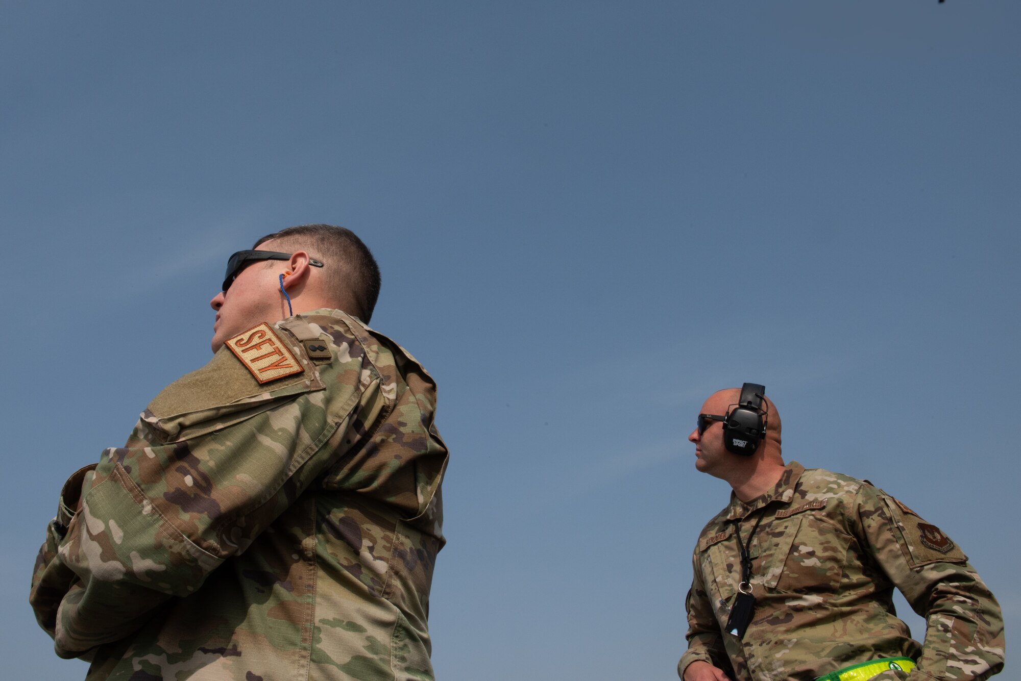 Master Sgt. Sean McBride (left) and Tech Sgt. Carter Strader, both weapons safety managers assigned to the 39th Air Base Wing Safety Office, scan the horizon for bird and wildlife hazards at Incirlik Air Base Turkey, Feb. 18, 2022. The Wing Safety Office is comprised of three sections (occupational, weapons and flight) that work together to assess risk, monitor trends, and prevent accidents. They also ensure industrial, weapons, and flight safety standards meet mission requirements in support of Wing, United States Air Forces in Europe-Air Forces Africa command, and Department of Defense objectives. (U.S. Air Force photo by Airman 1st Class Brandt Self)