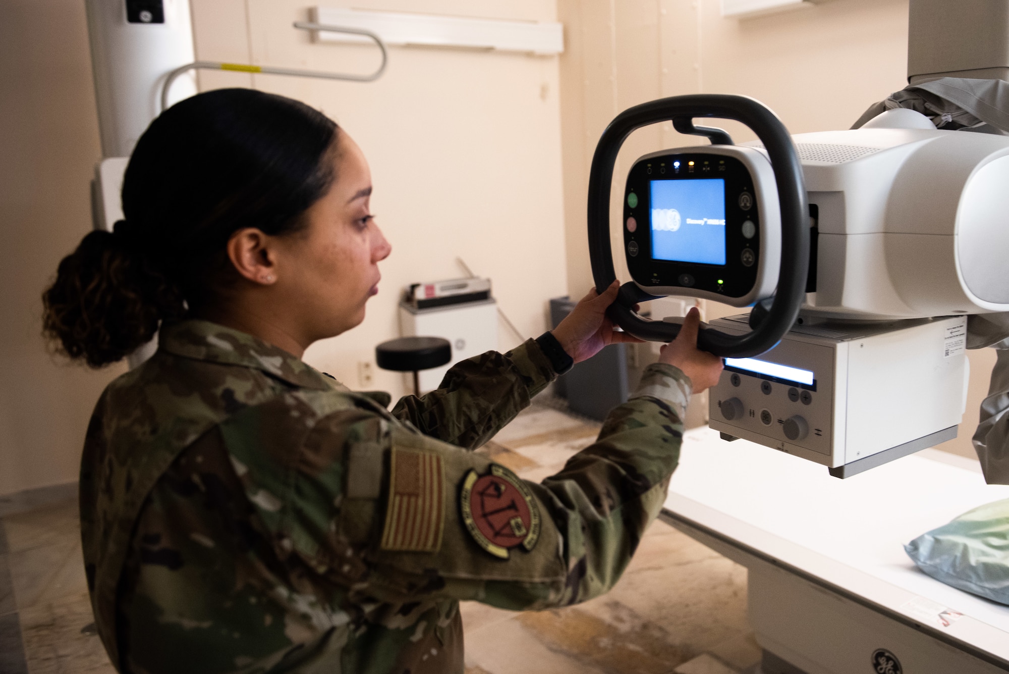 Staff Sgt. Gloria Garcia, an ultrasound technician assigned to the 39th Medical Group, takes a diagnostic X-ray image at Incirlik Air Base, Turkey, March 14, 2022. Radiology uses X-rays to photograph human anatomy to assist doctors in identifying potential disease and injury. (U.S. Air Force photo by Airman 1st Class Brandt Self)