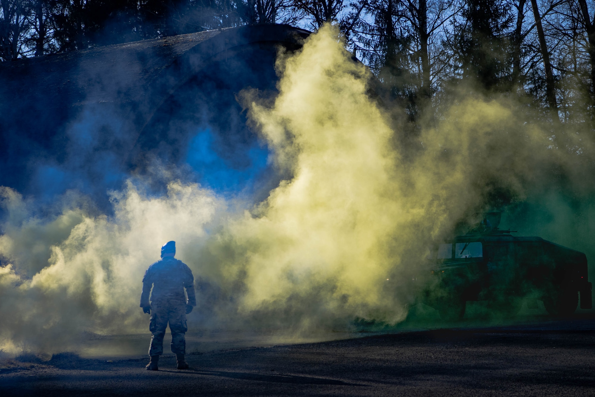 Airman stands in smoke