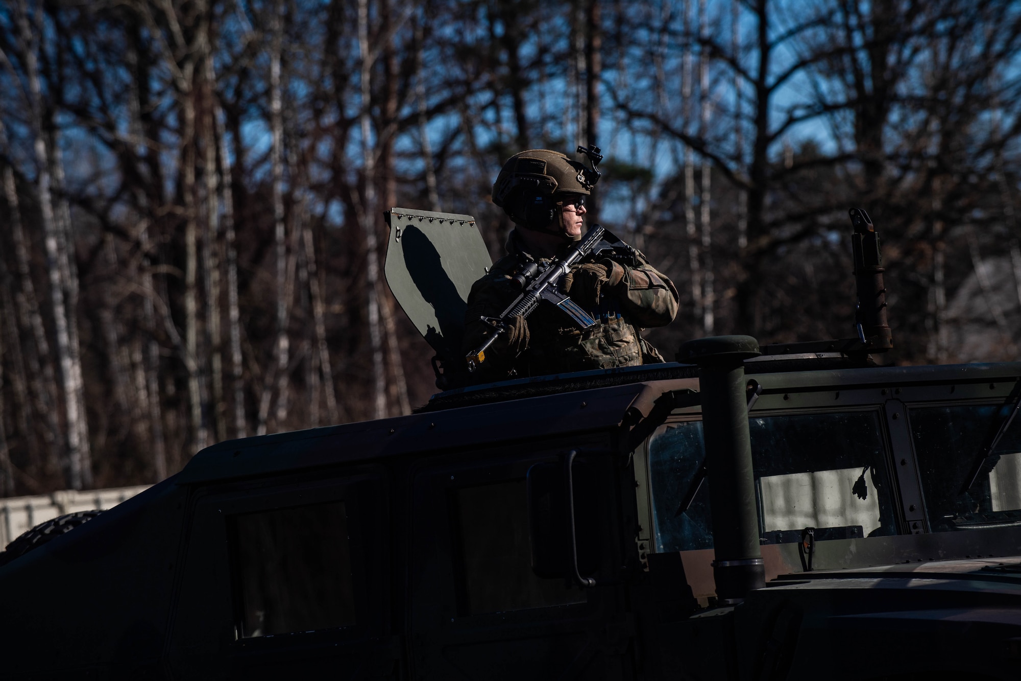 Airman holds gun